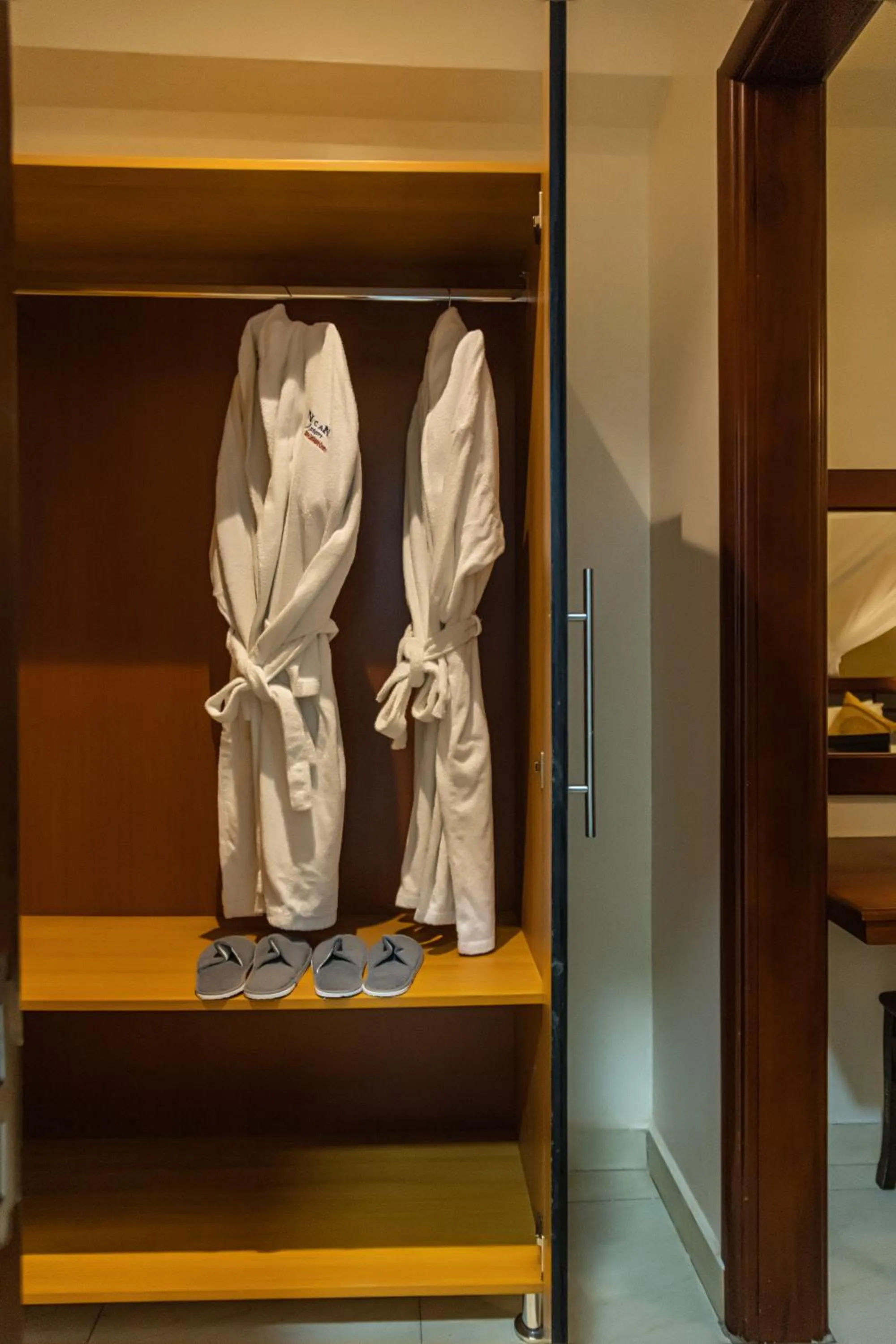 wardrobe, Bed in Nican Resort Hotel Seguku Entebbe