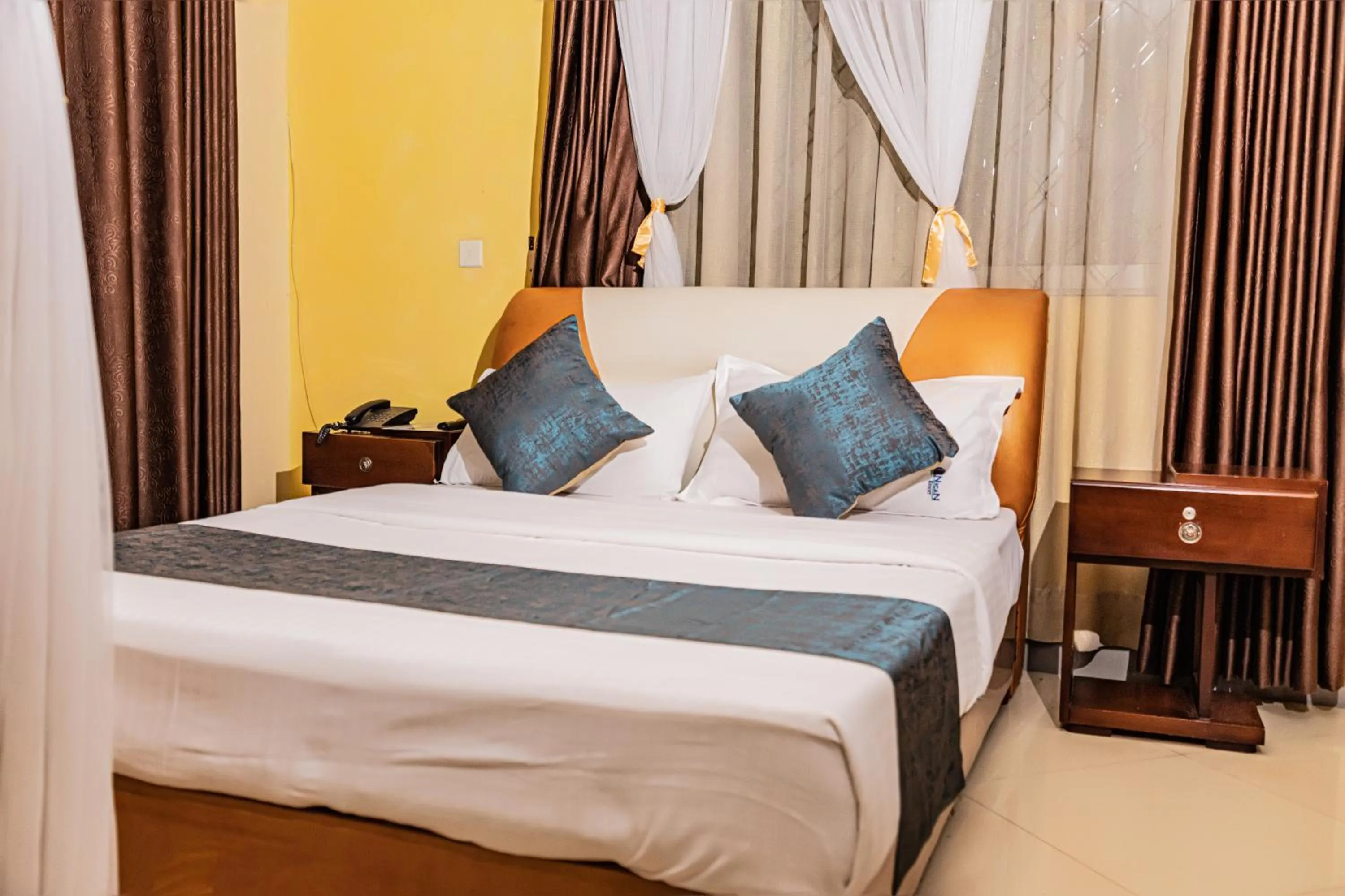Bed in Nican Resort Hotel Seguku Entebbe