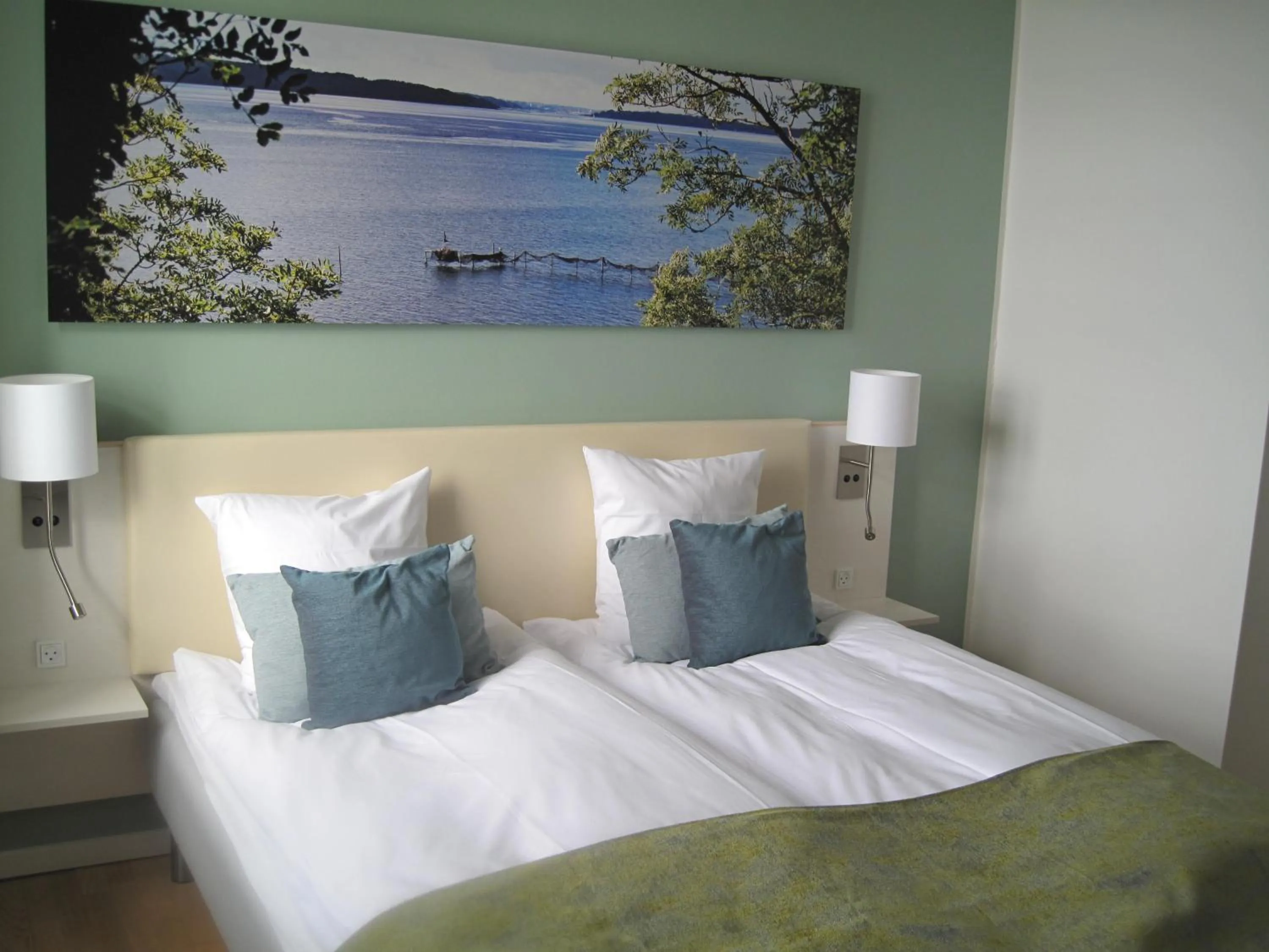 Bed in Sixtus Sinatur Hotel & Konference