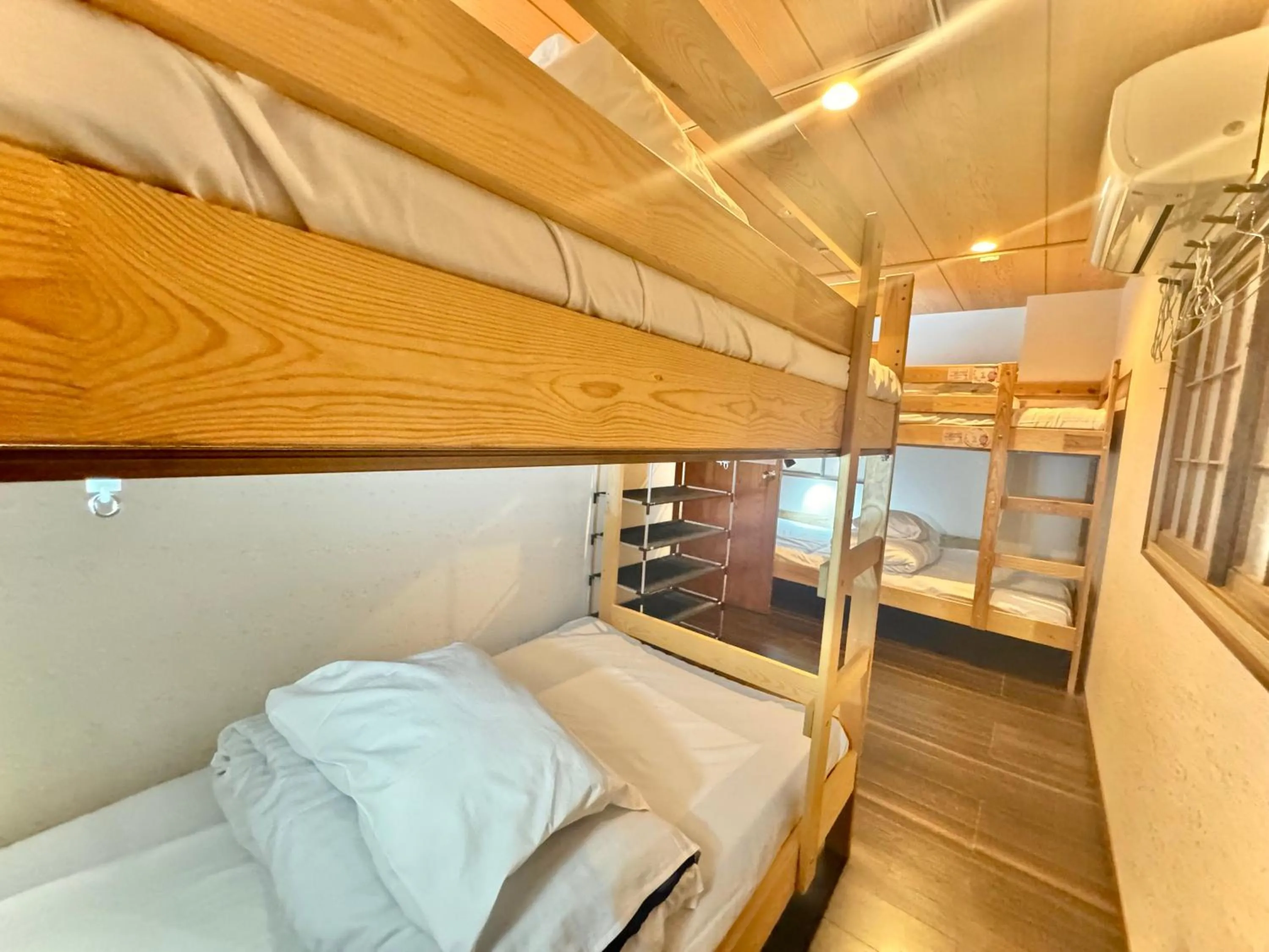 Bed in Osaka Guesthouse Sakura