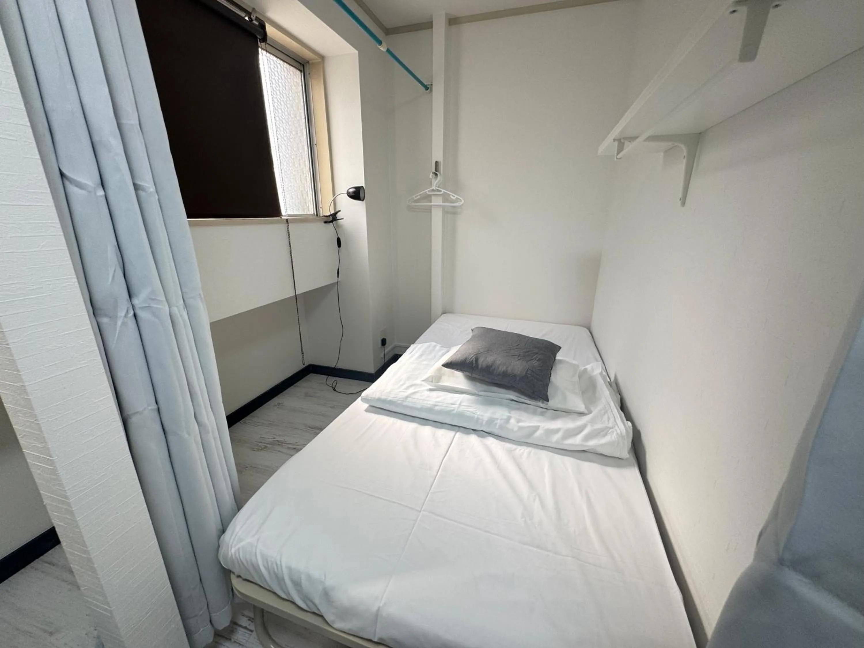 Bed in Osaka Guesthouse Sakura