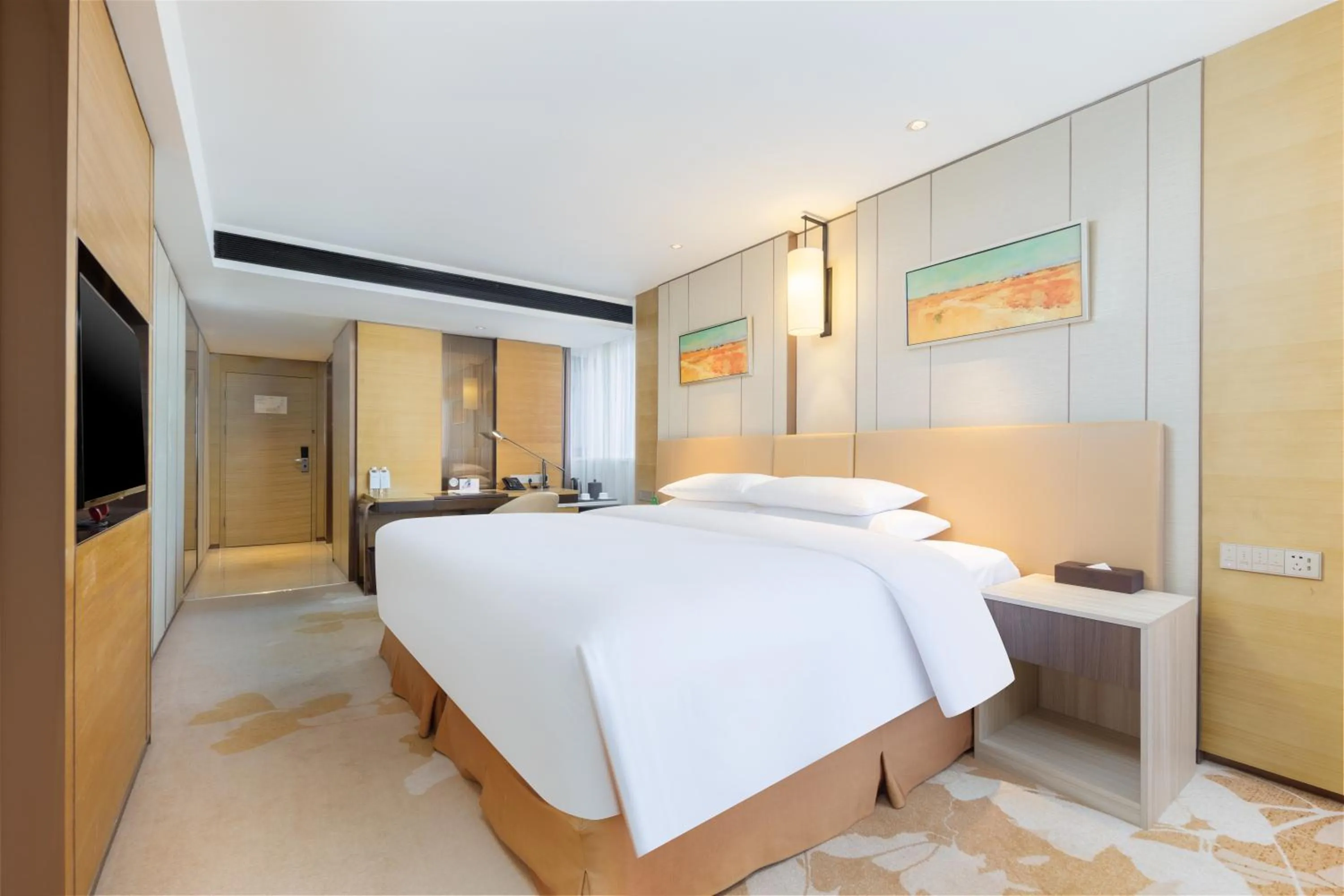 Bed in Grand Metropark Hotel Beijing