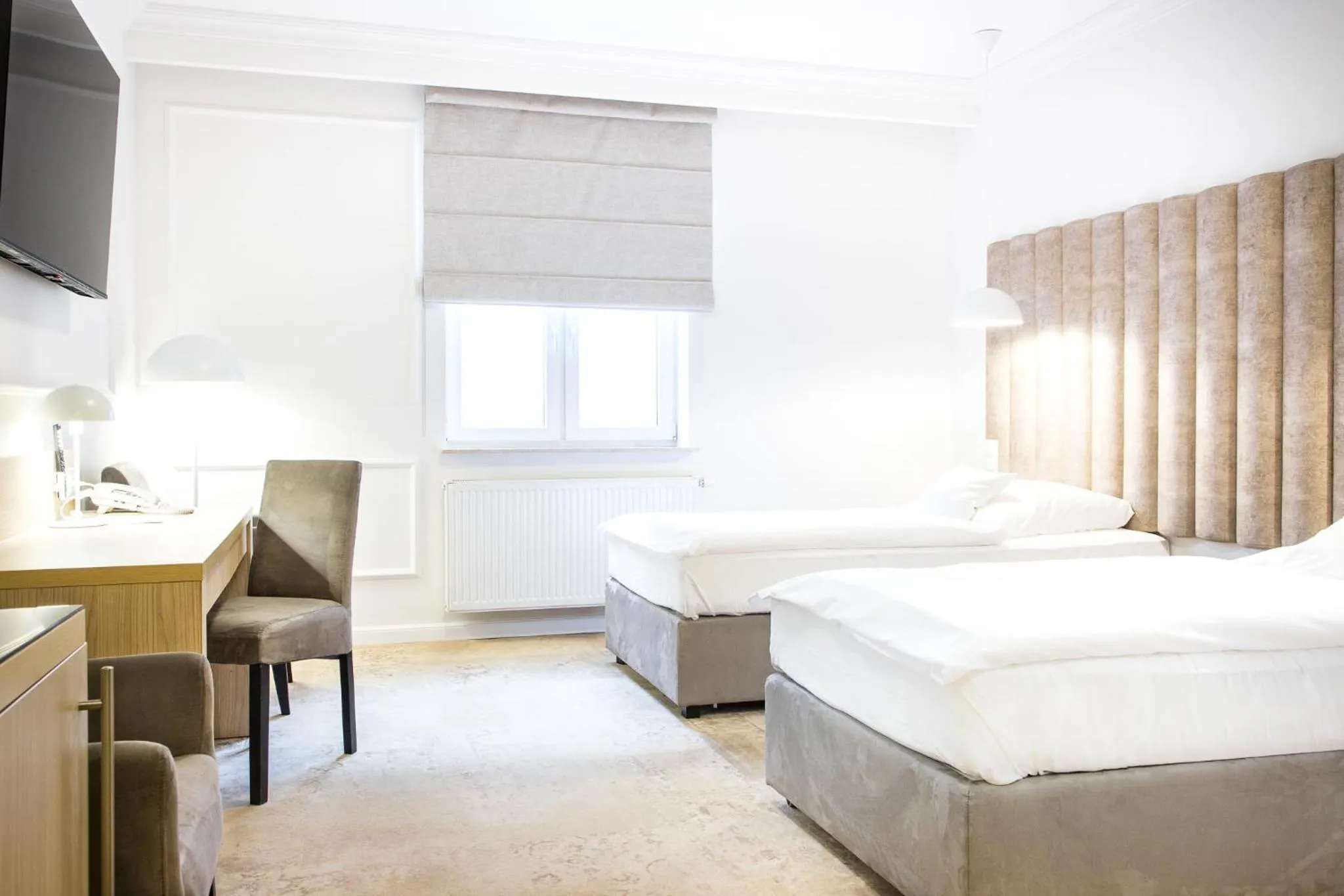 Bed in Europejski Boutique Hotel