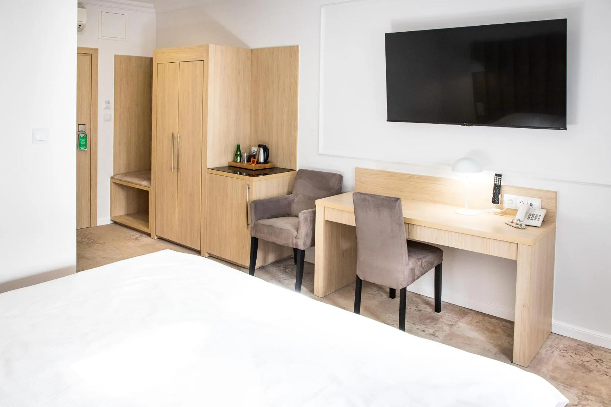 Bed in Europejski Boutique Hotel