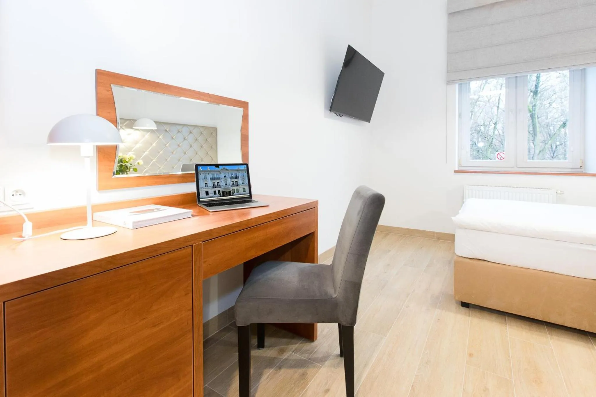 Bed in Europejski Boutique Hotel