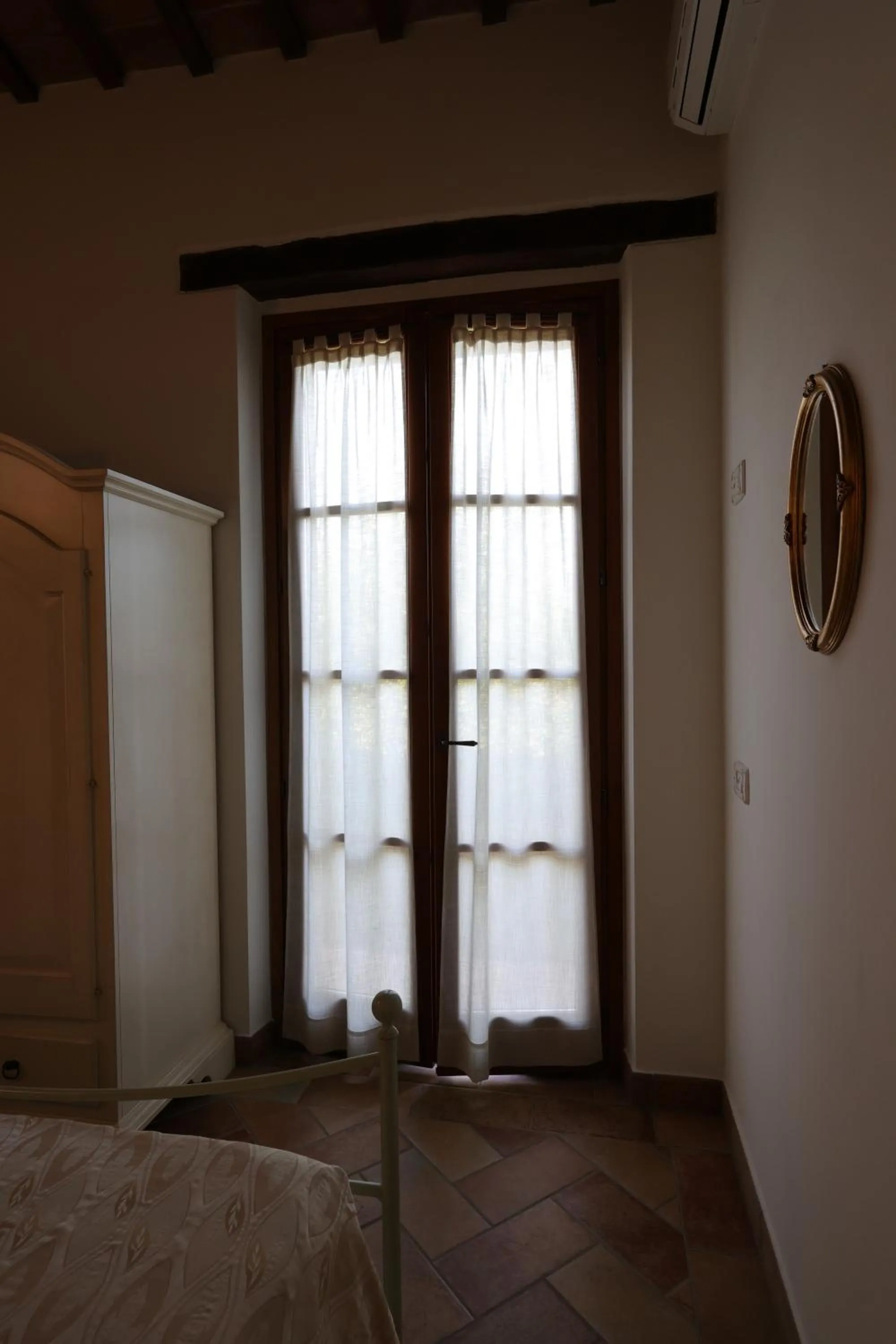 Bed in Valle del Metauro Country House