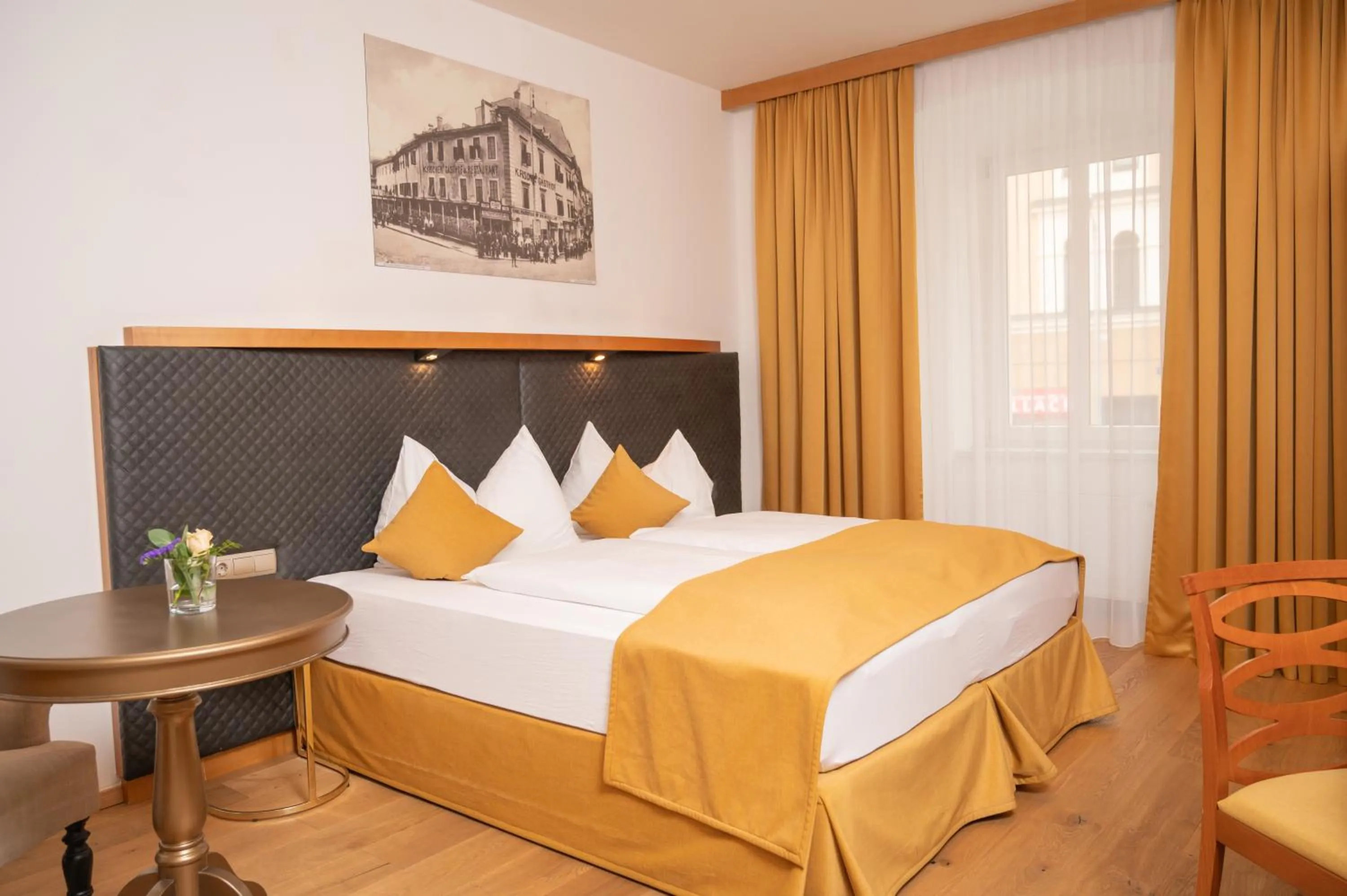 Photo of the whole room, Bed in Boutique Hotel Goldenes Lamm Villach
