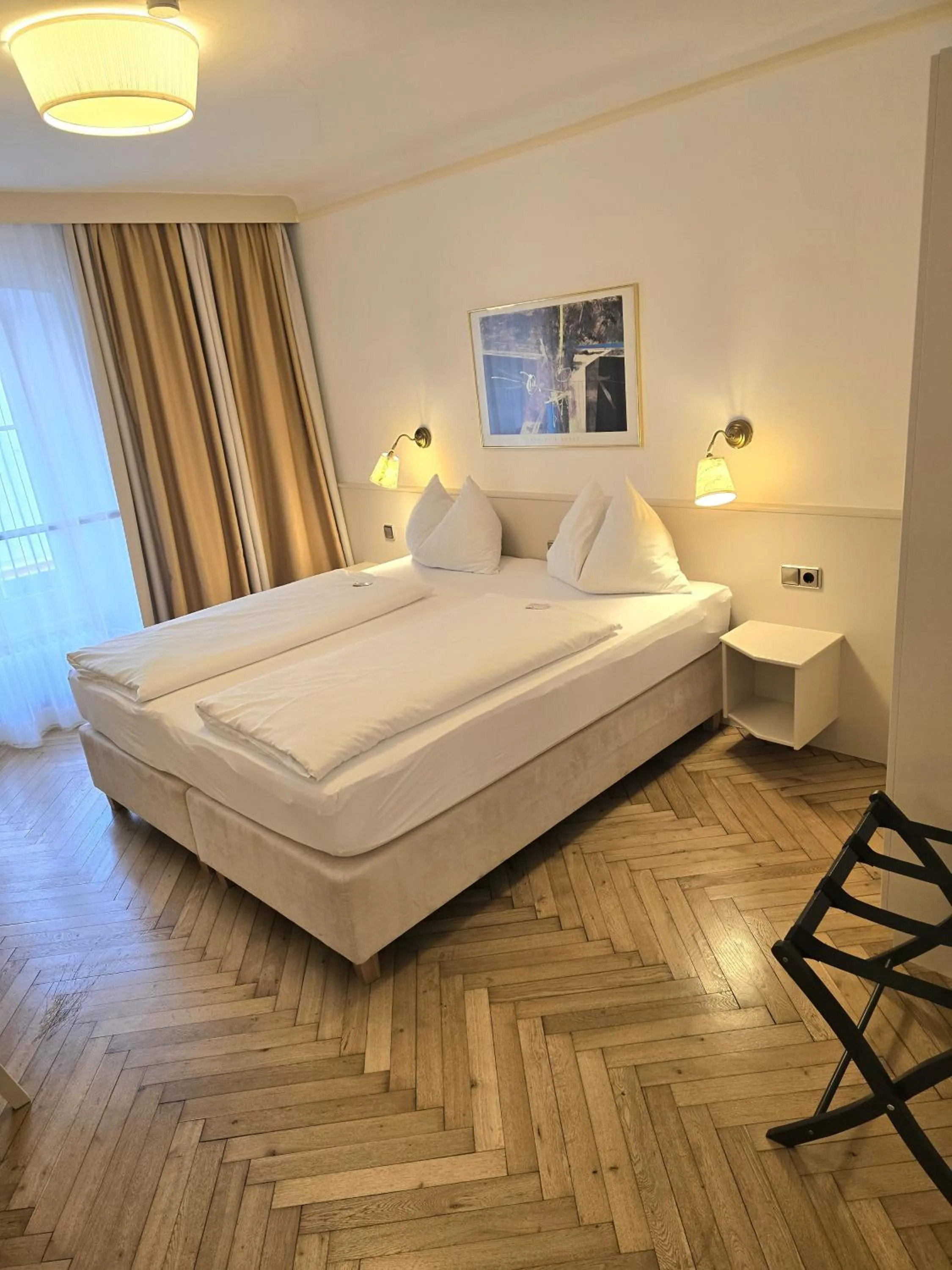 Bed in Boutique Hotel Goldenes Lamm Villach