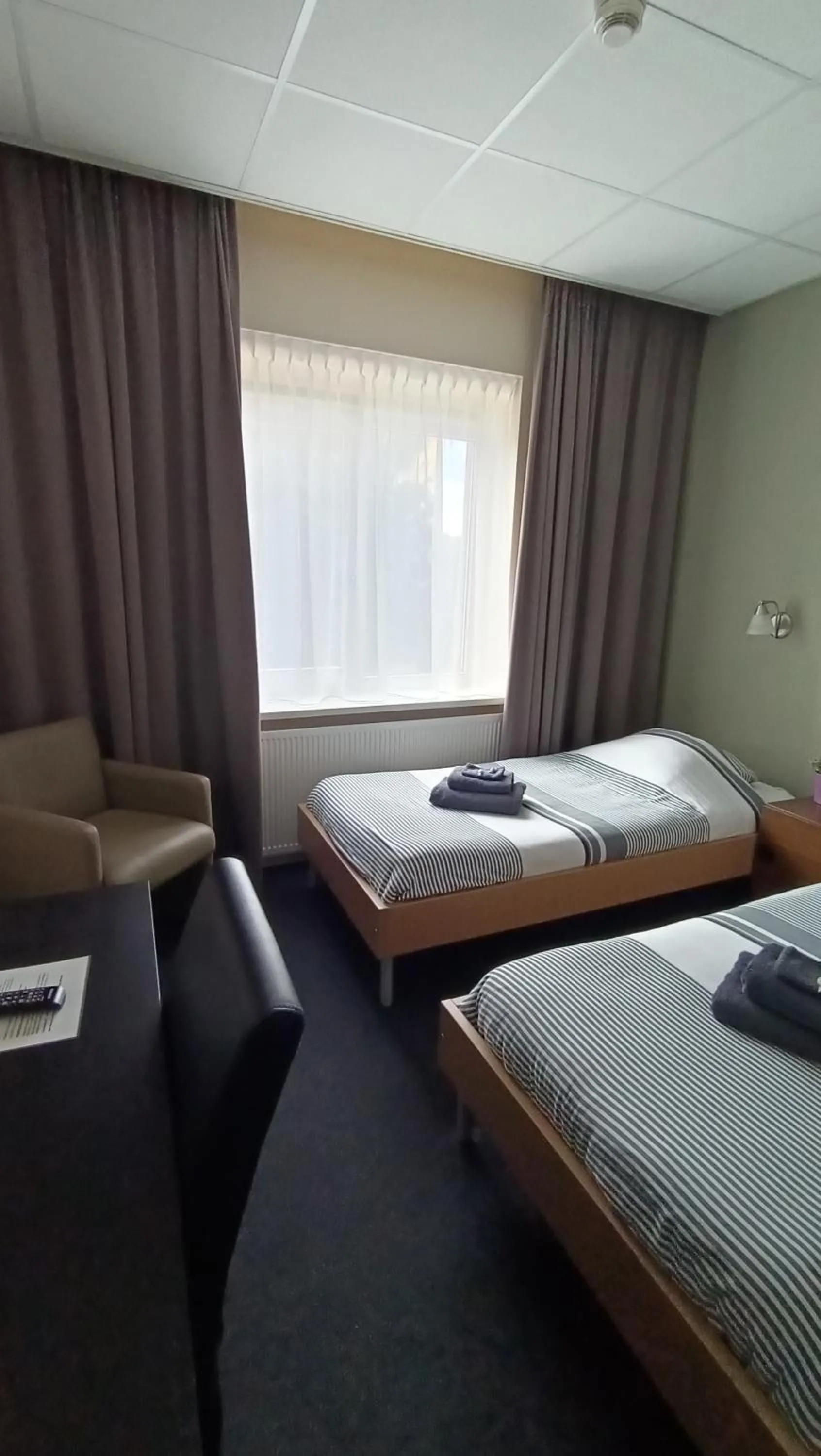 Bed in Hotel Rozenburg