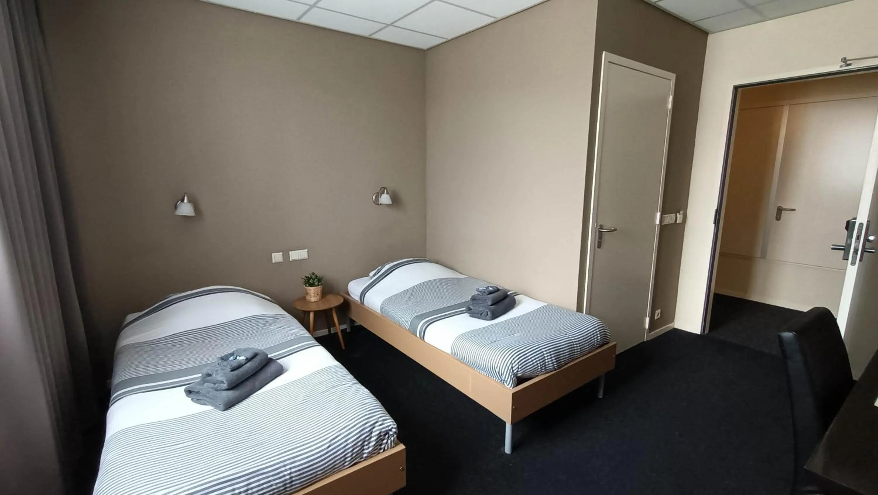 Bed in Hotel Rozenburg