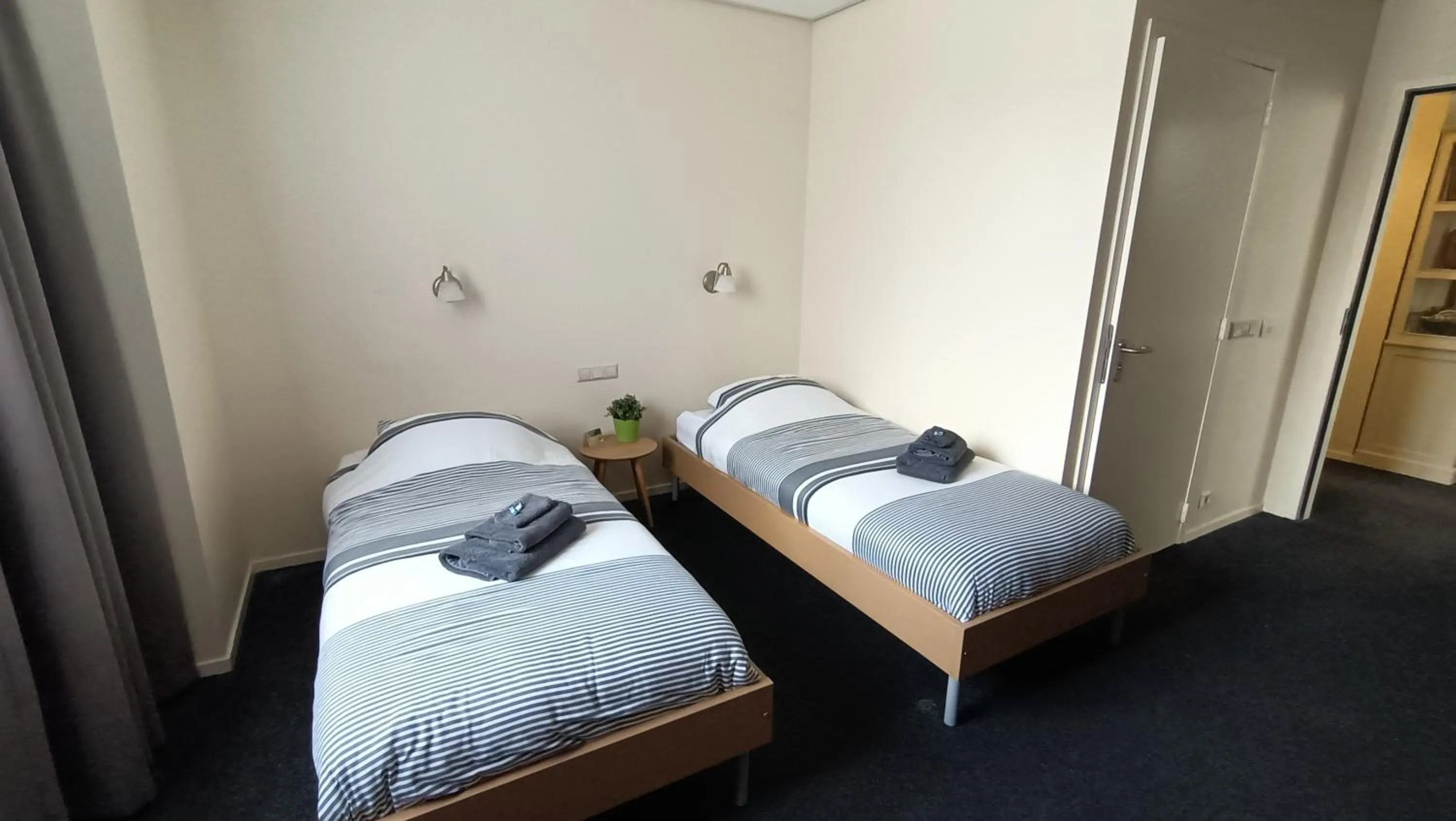 Bed in Hotel Rozenburg