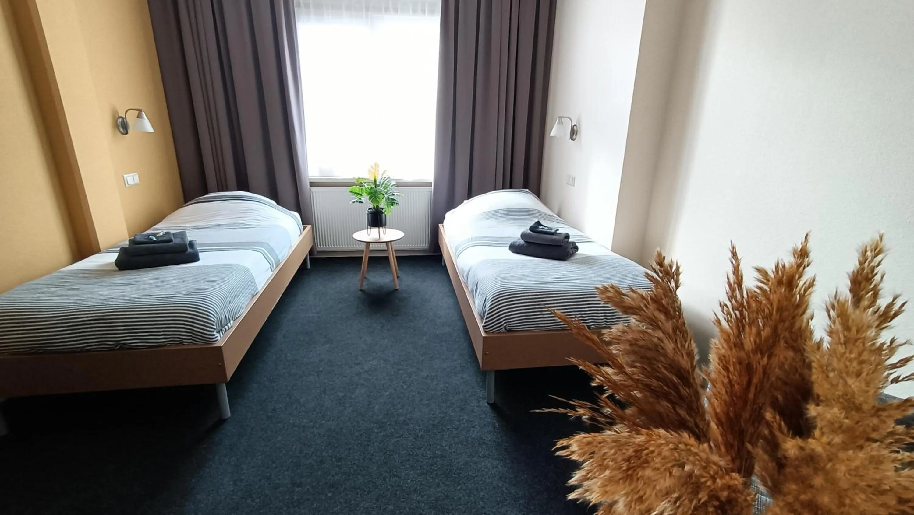 Bed in Hotel Rozenburg