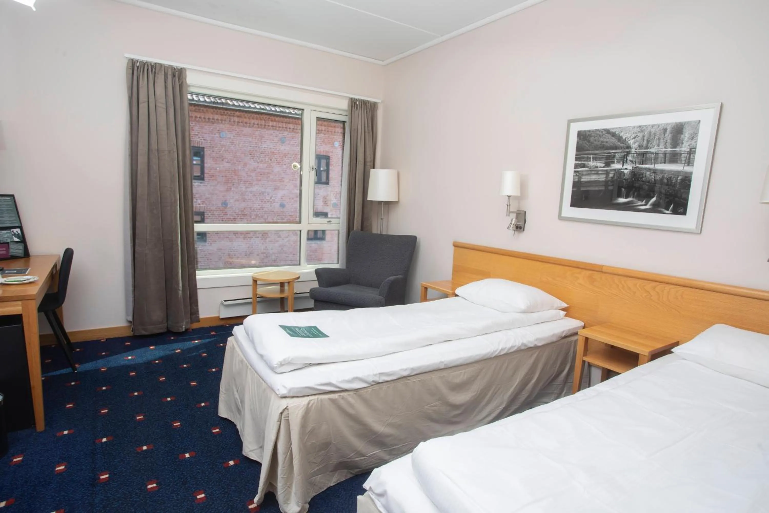 Bed in Clarion Collection Hotel Bryggeparken