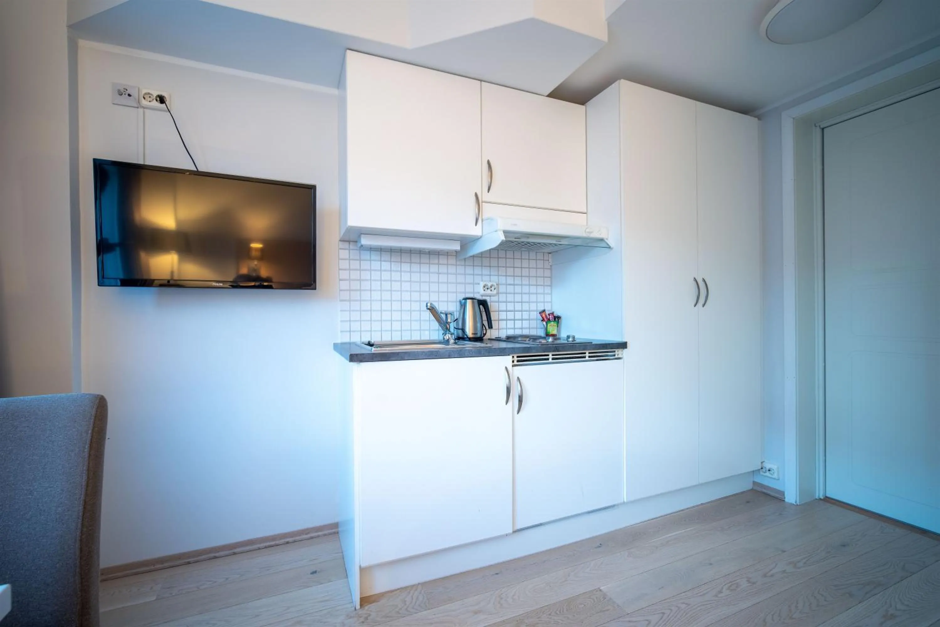 Kitchen or kitchenette in Enter City Hotel
