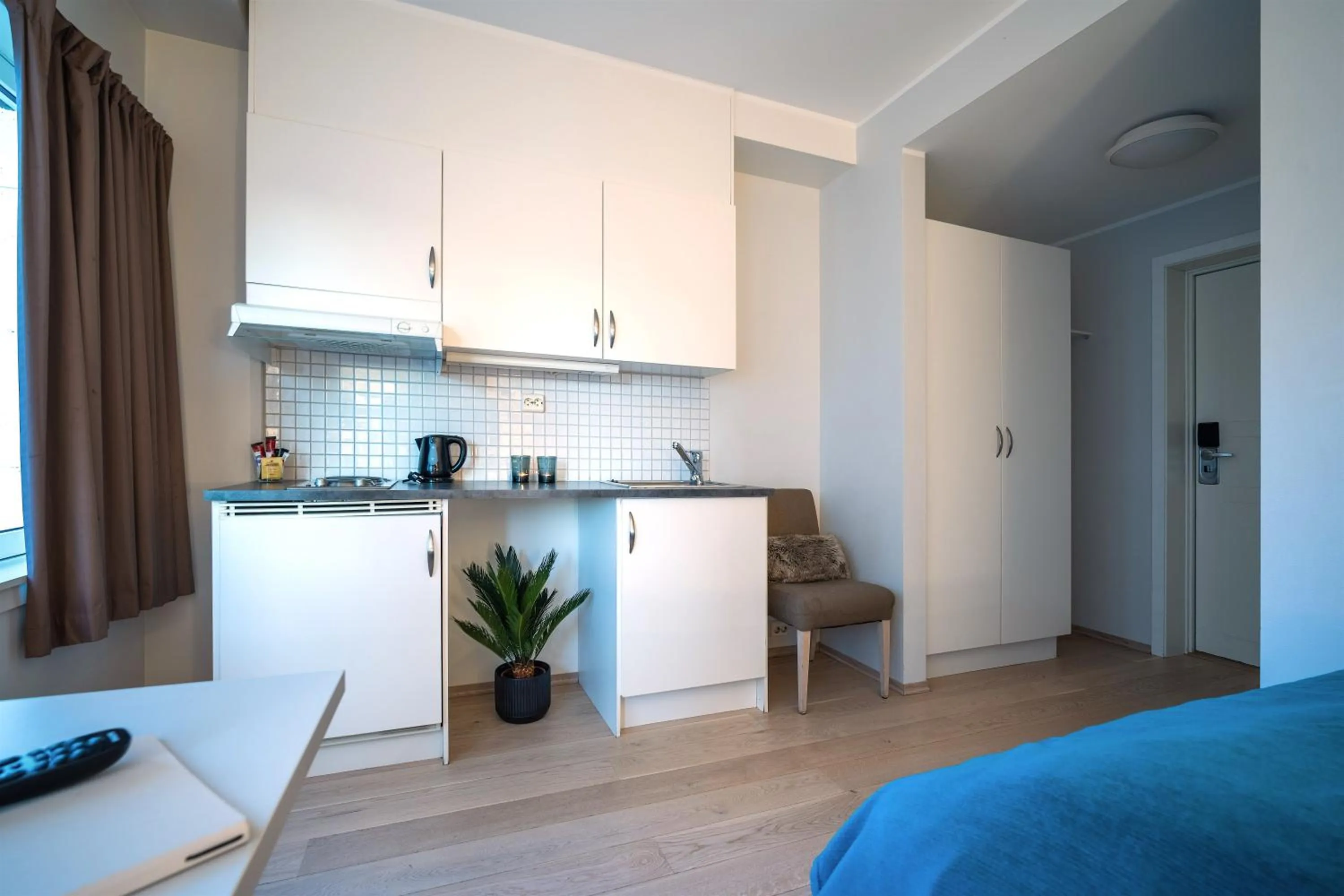 Kitchen or kitchenette in Enter City Hotel