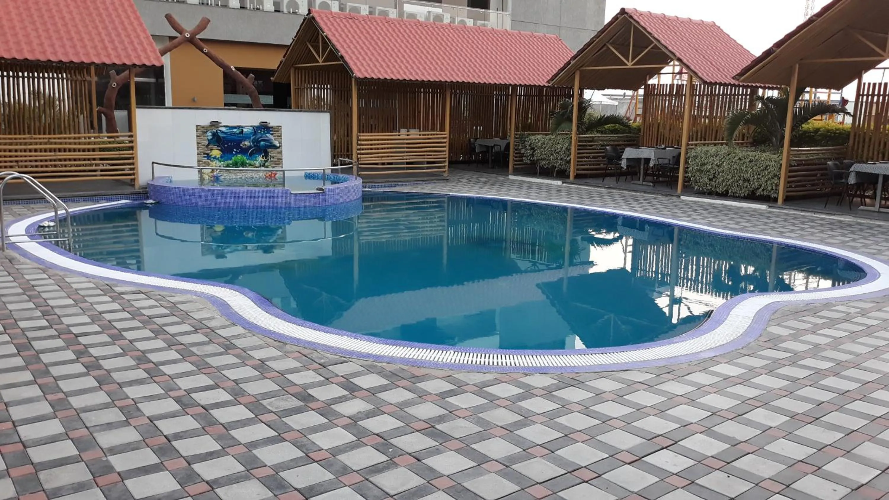 Swimming pool in The Divine Resort Somnath