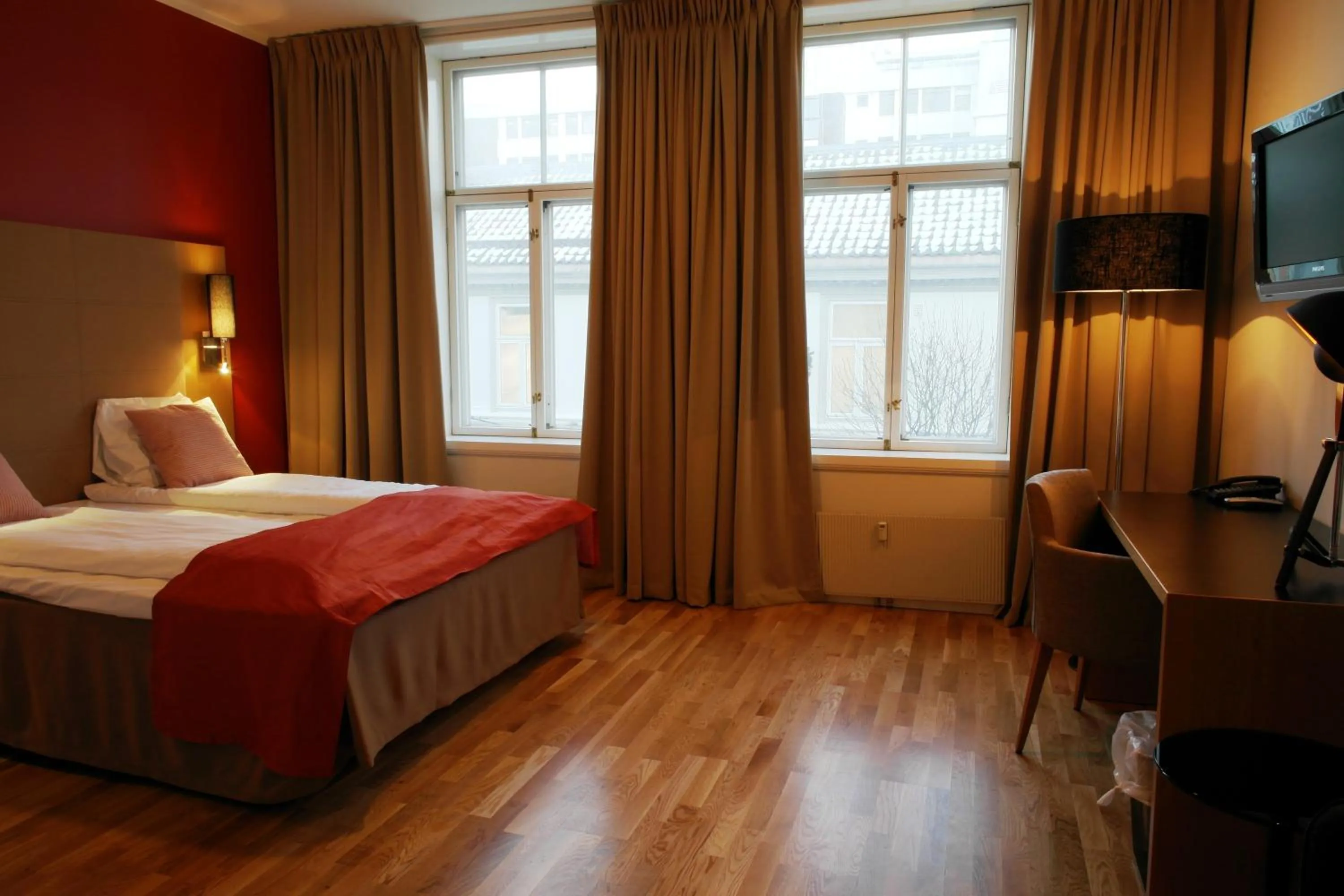 Photo of the whole room in City Living Schøller Hotel