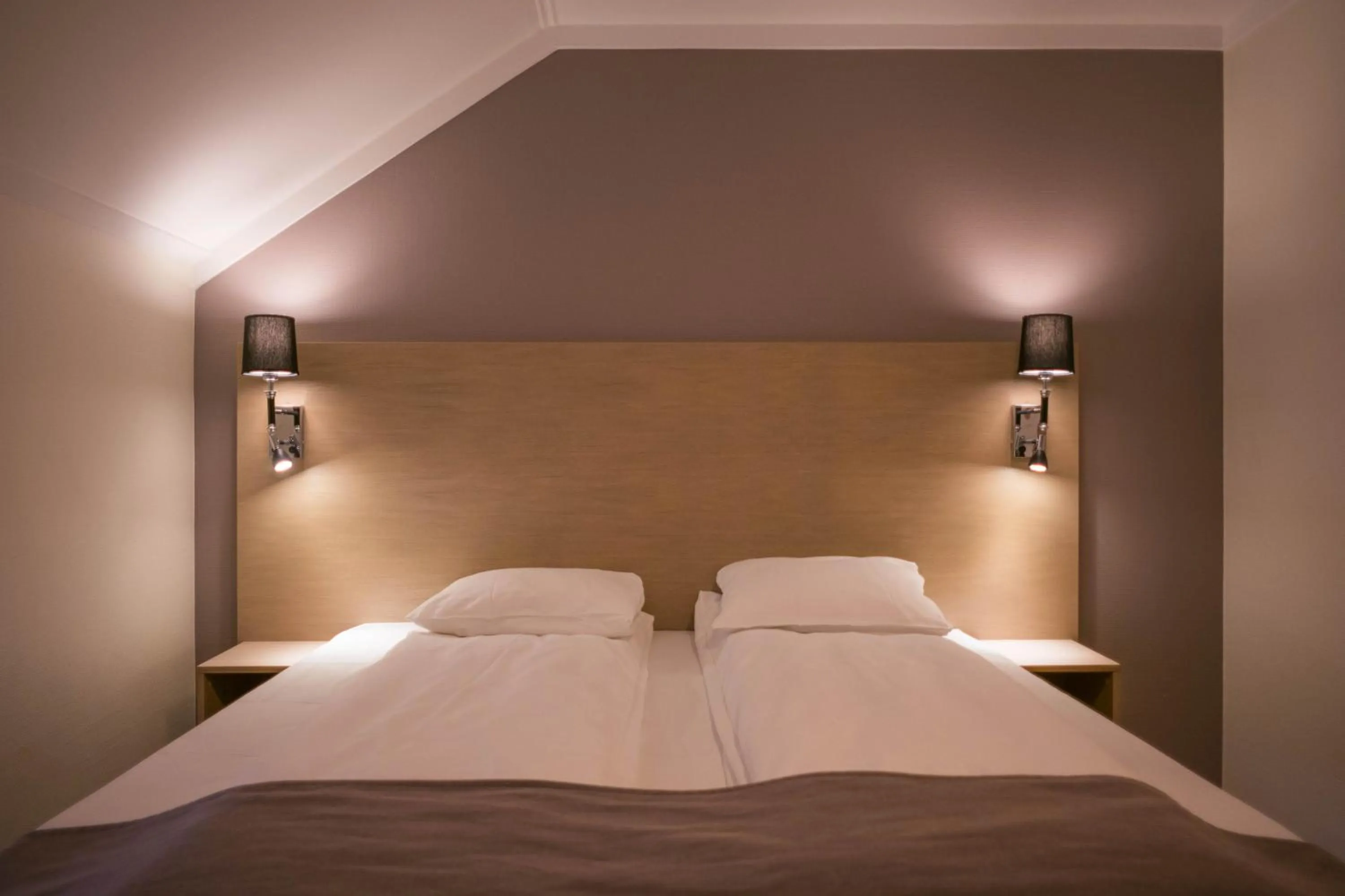 Bed in City Living Schøller Hotel