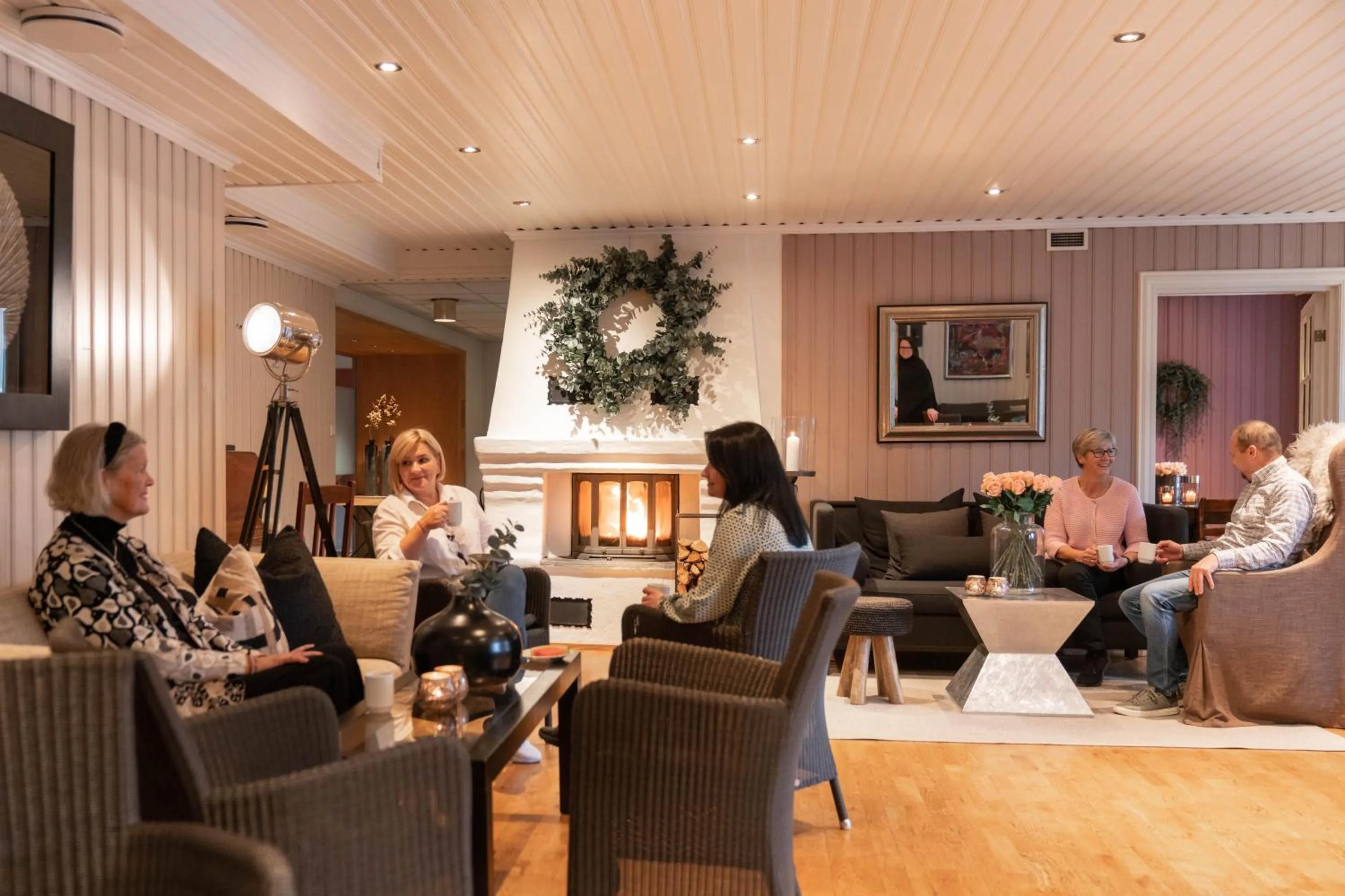 Communal lounge/ TV room in Lampeland Hotel