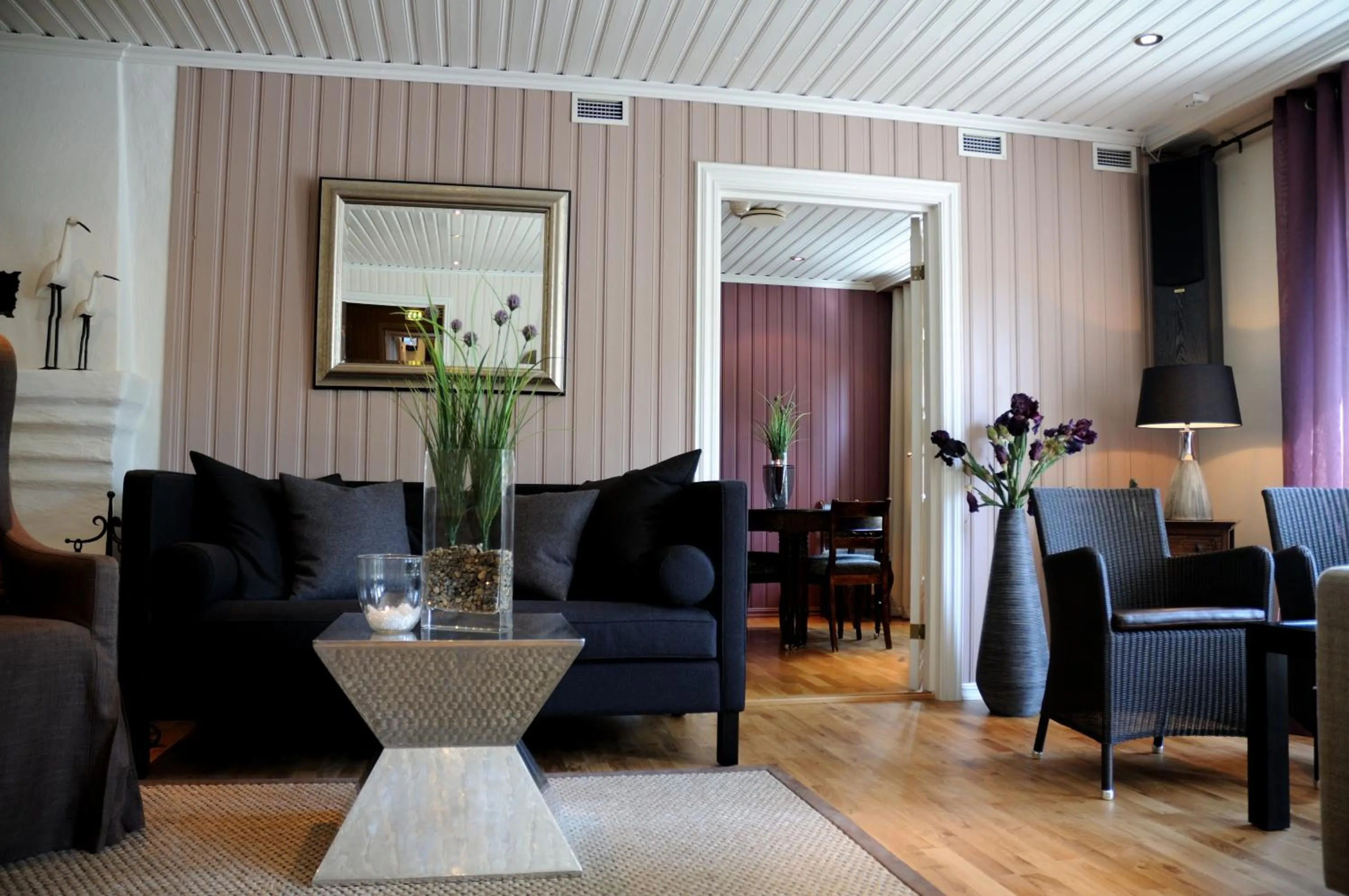 Communal lounge/ TV room in Lampeland Hotel