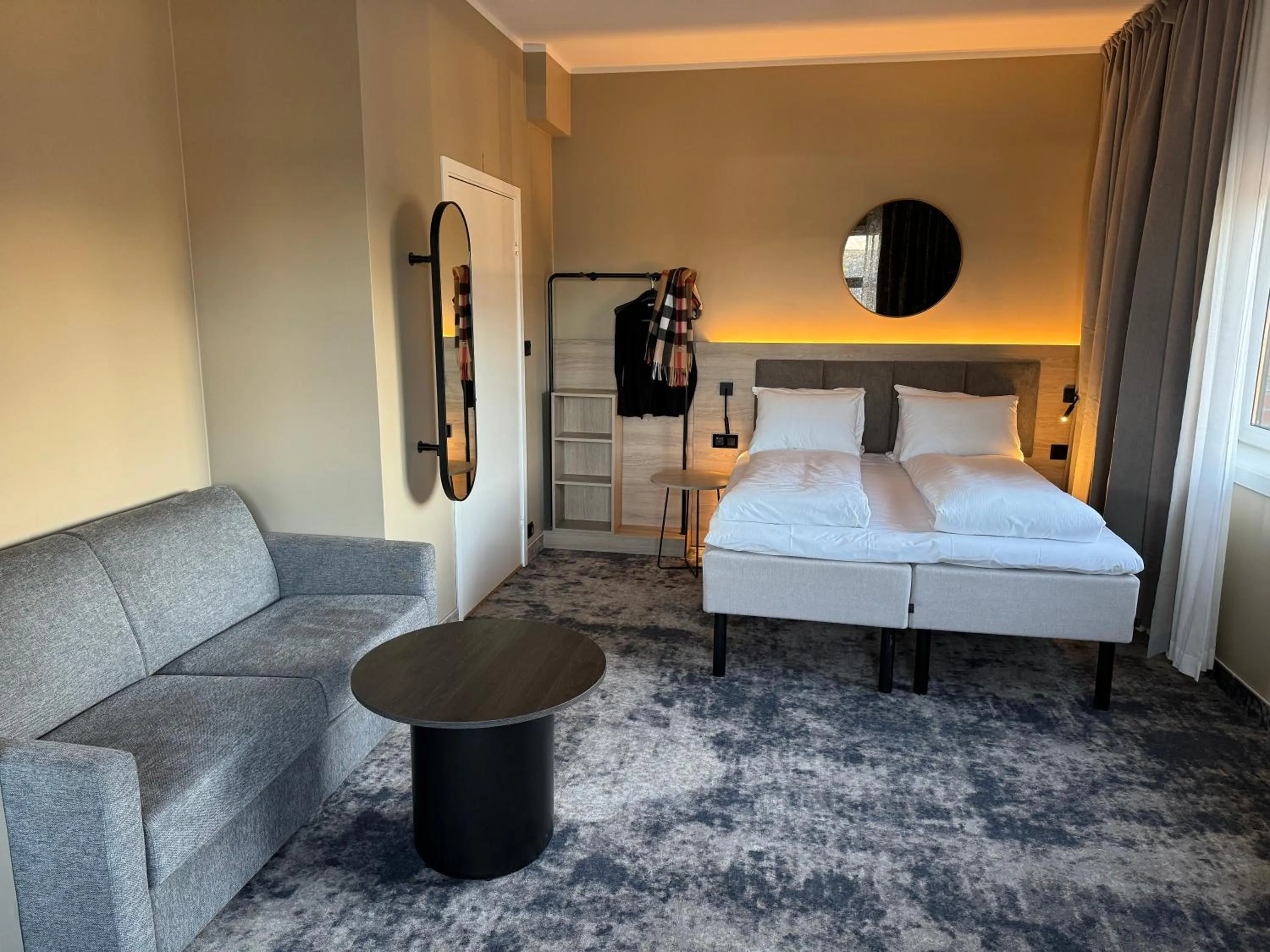 Seating area, Bed in Notodden Hotel