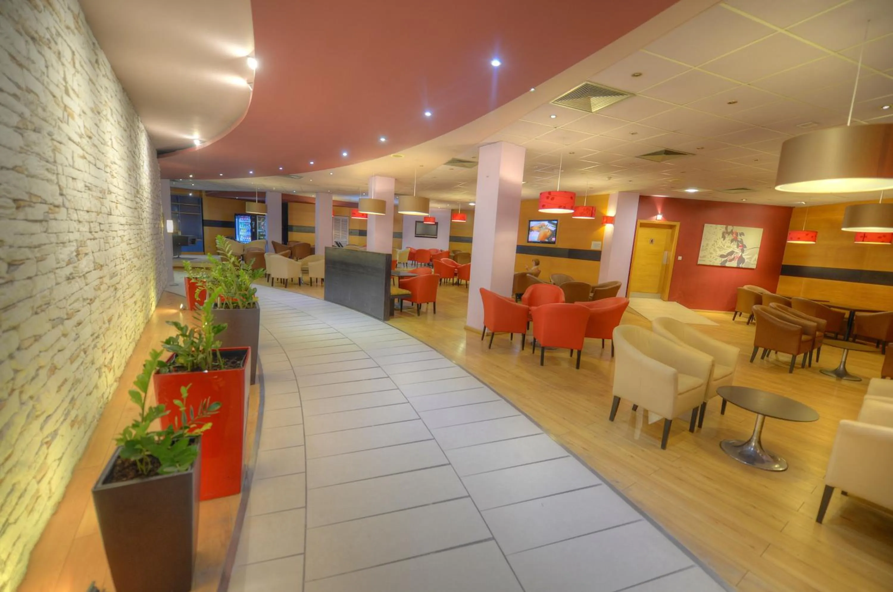 Communal lounge/ TV room in The Preluna Hotel