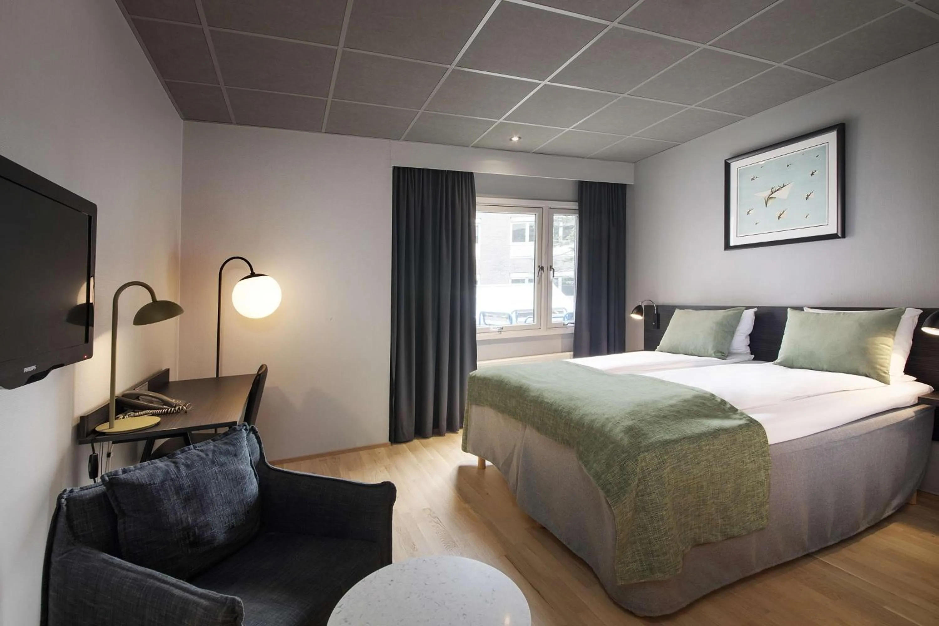 Photo of the whole room, Bed in Scandic Ambassadeur Drammen
