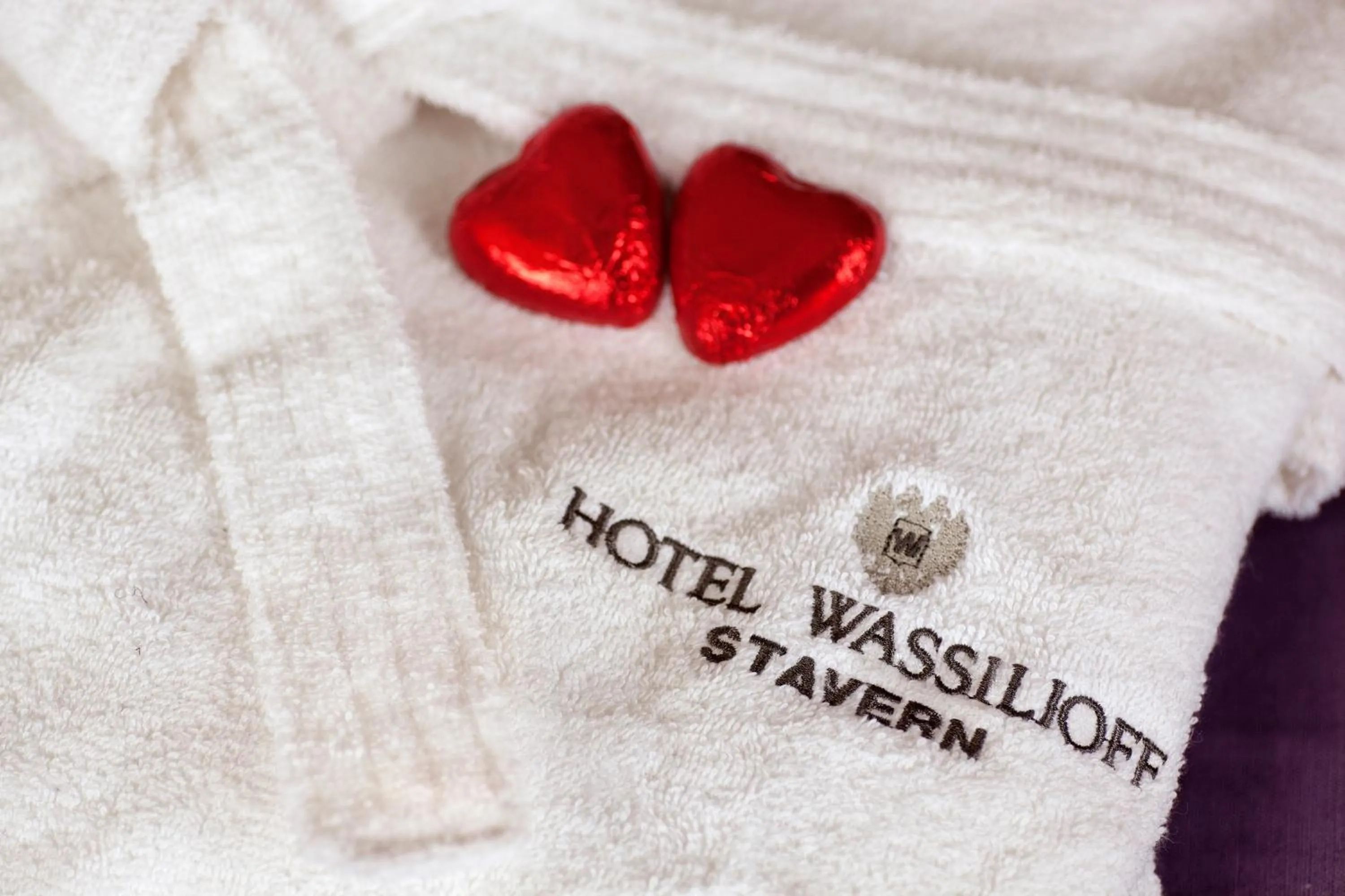 Property logo or sign in Hotel Wassilioff - Unike Hoteller