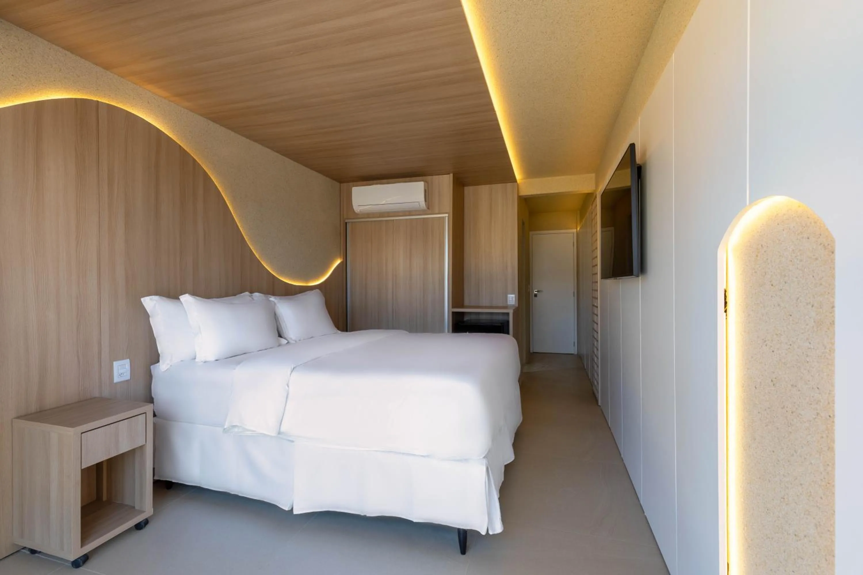 Bed in Pousada Estrela de Paraty