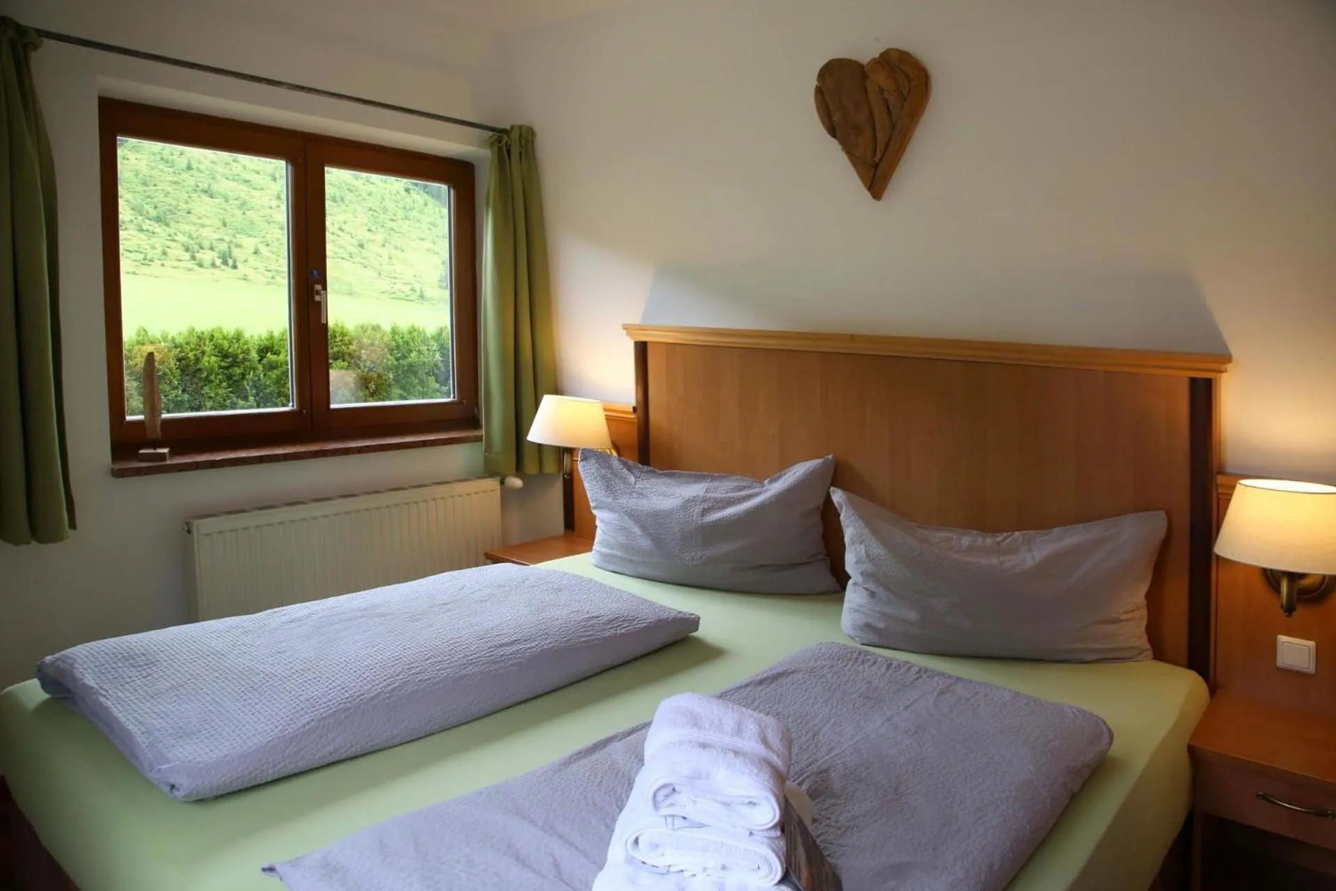 Photo of the whole room, Bed in Die Filzmooserin - Apartments in Filzmoos, Filzmoos Card inklusive