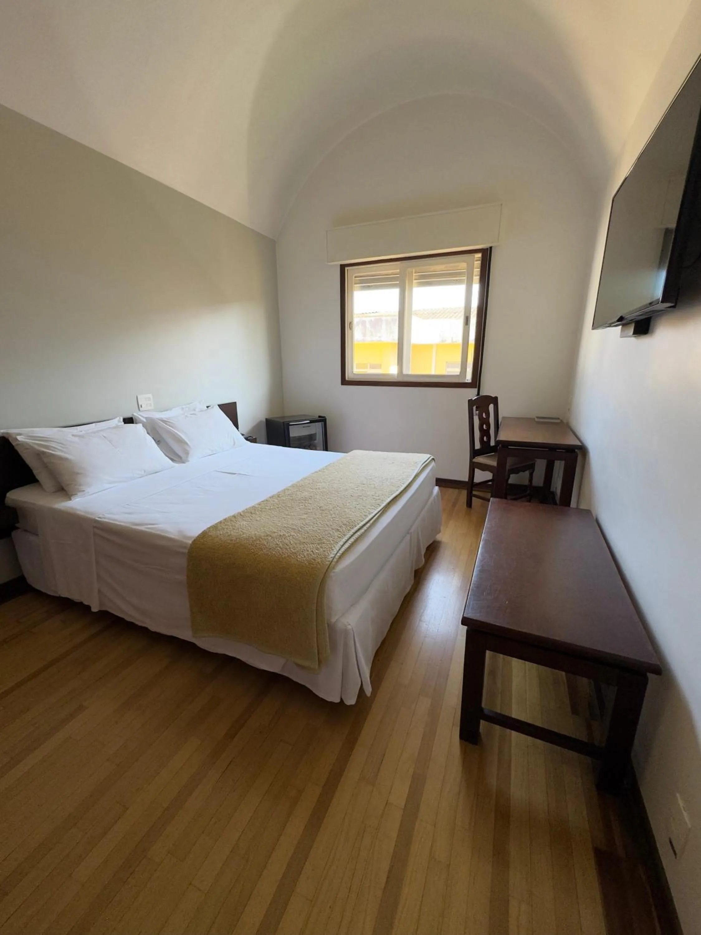 Bed in Arcadas Hotel