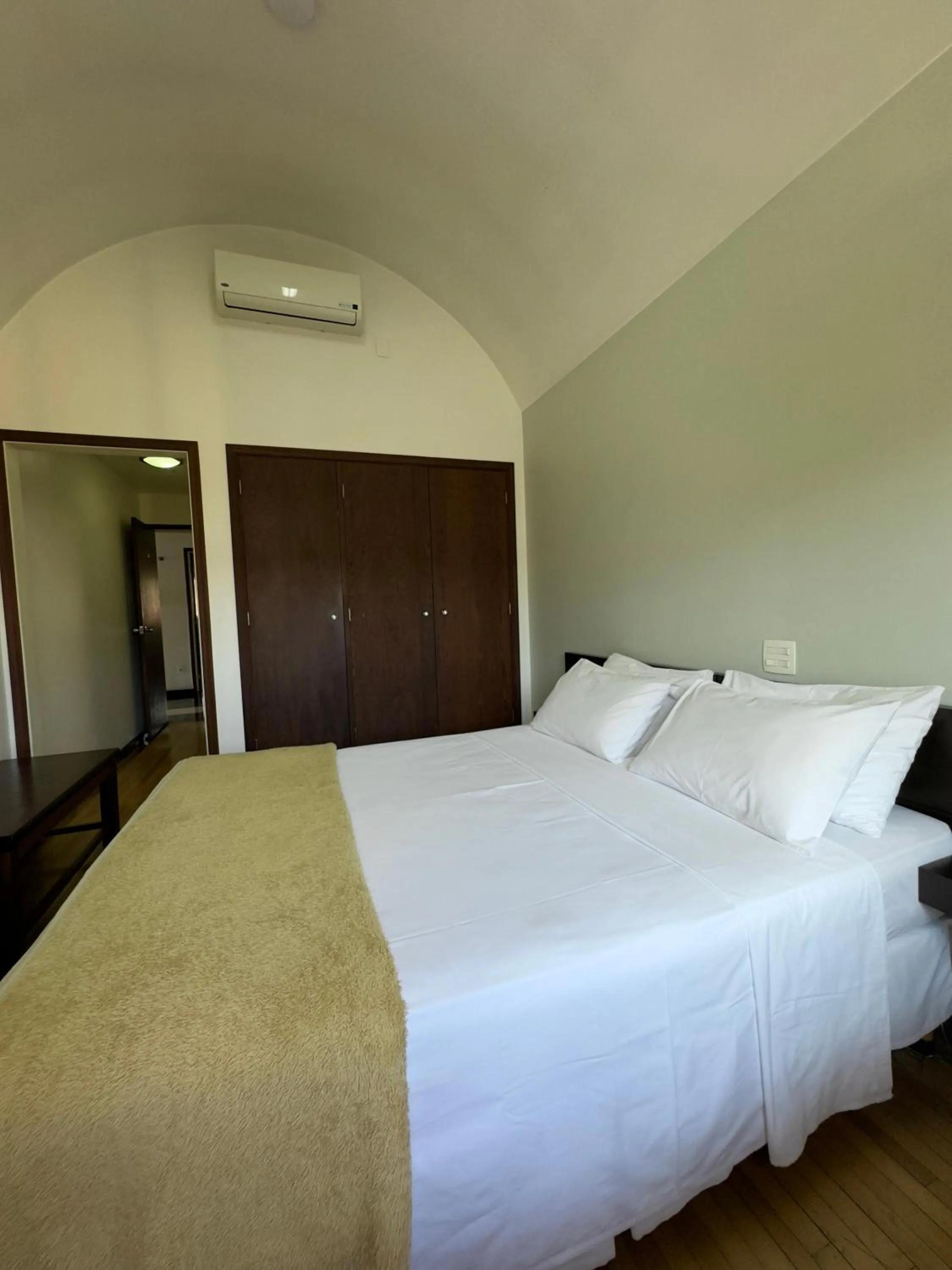 Bed in Arcadas Hotel