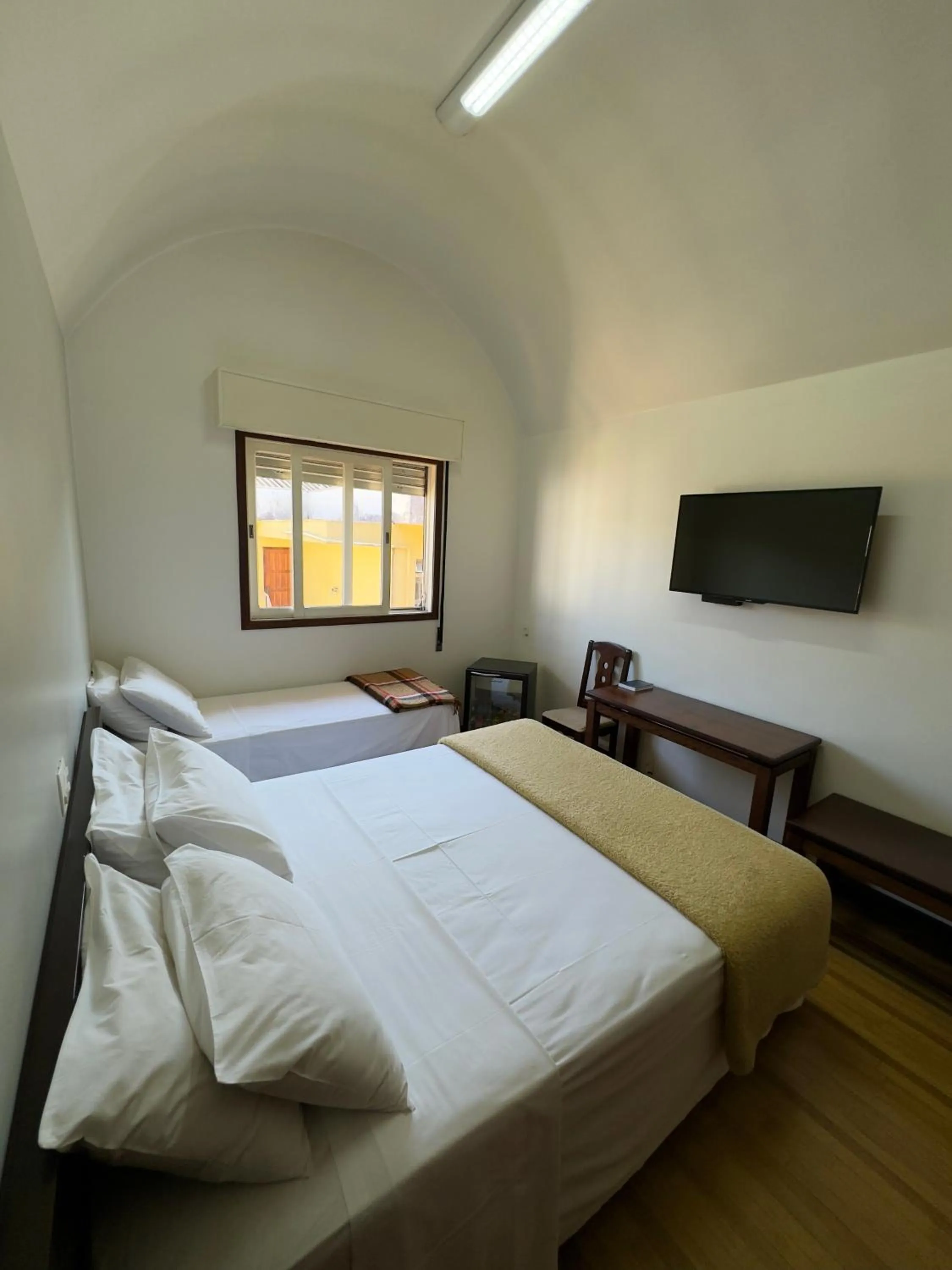 Bed in Arcadas Hotel