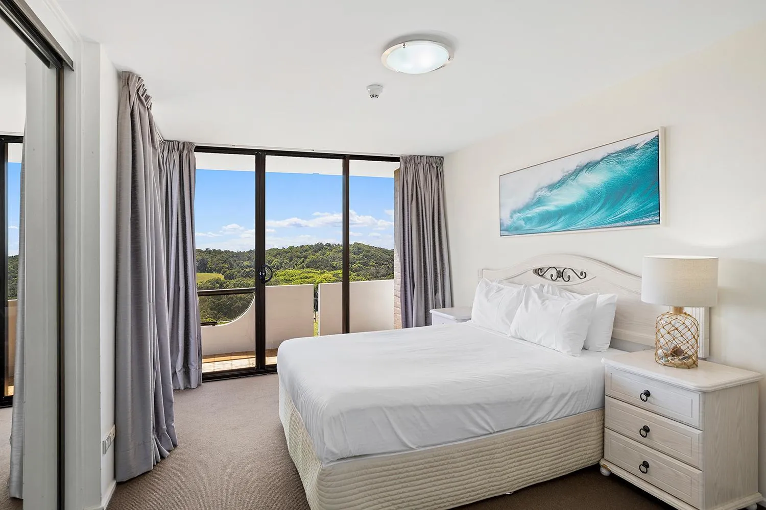 Bed in Pacific Towers Beach Resort