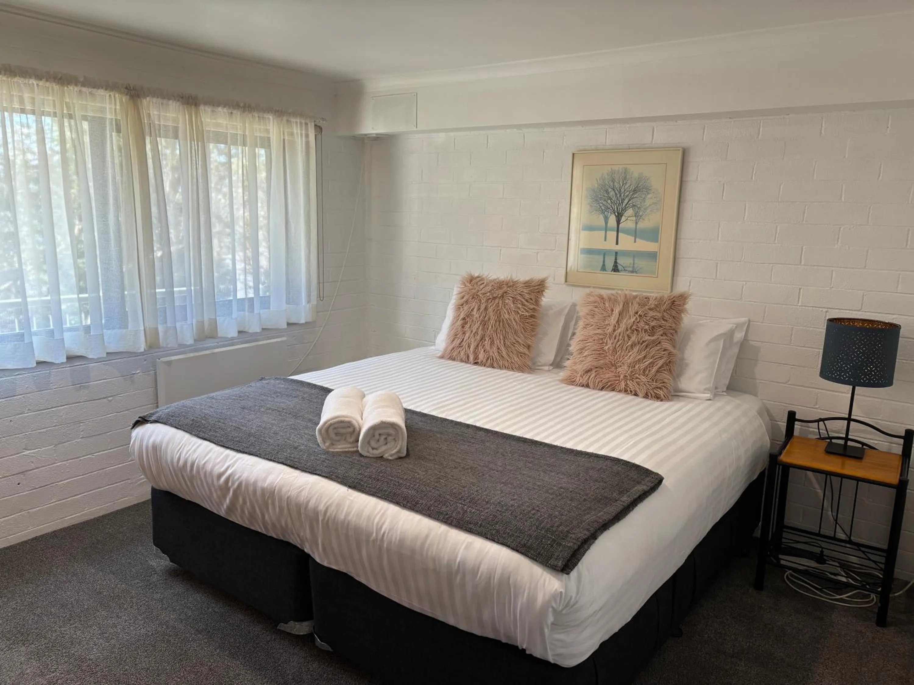 Bed in Cedarwood Apartments