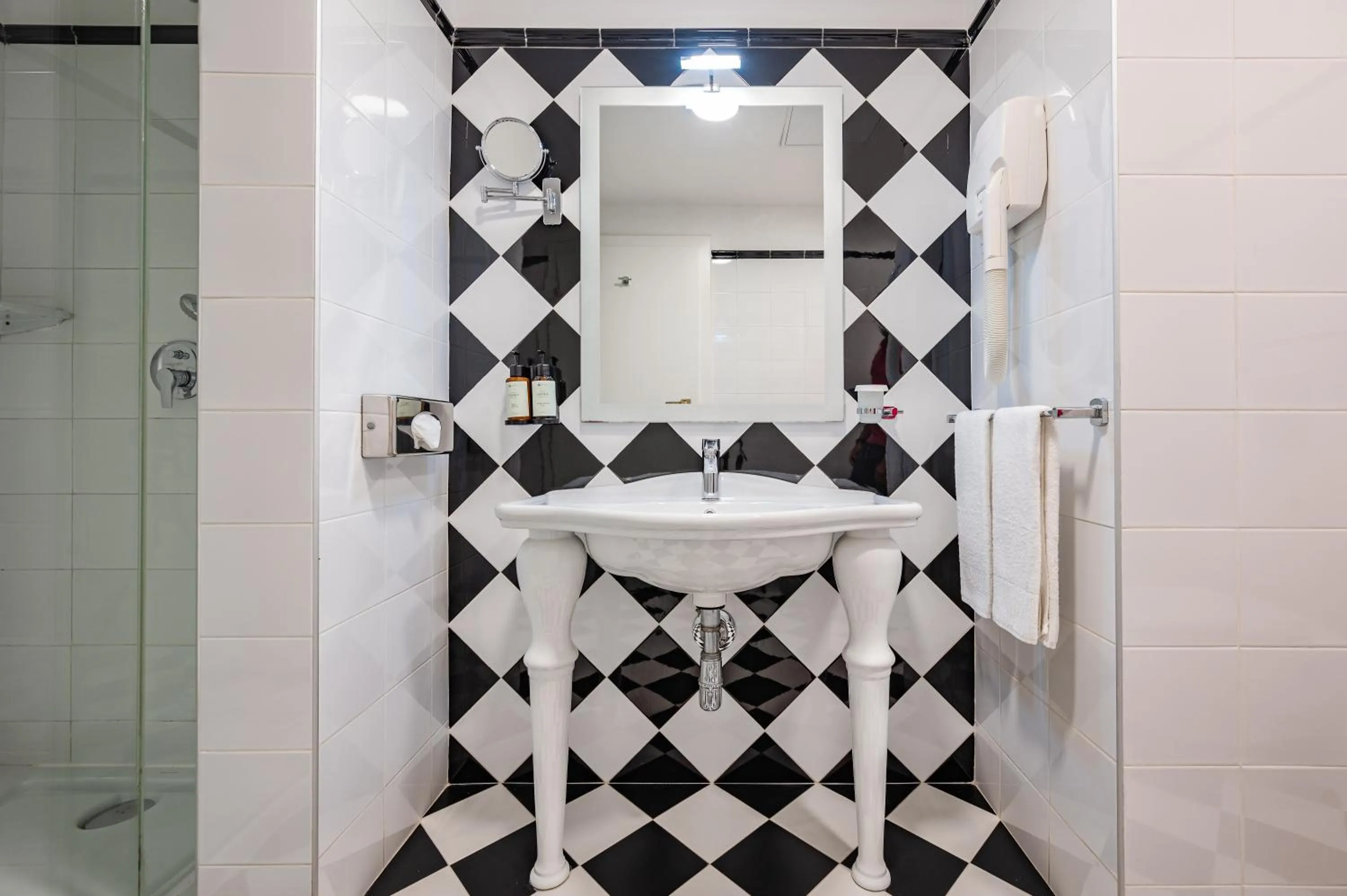 Bathroom in AX The Victoria Hotel