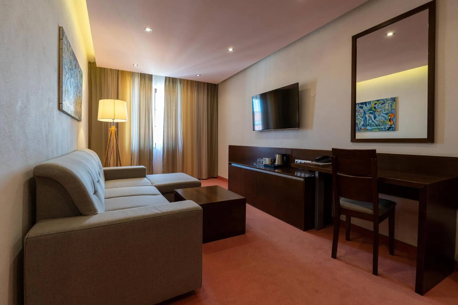 Communal lounge/ TV room in Hotel Arkada