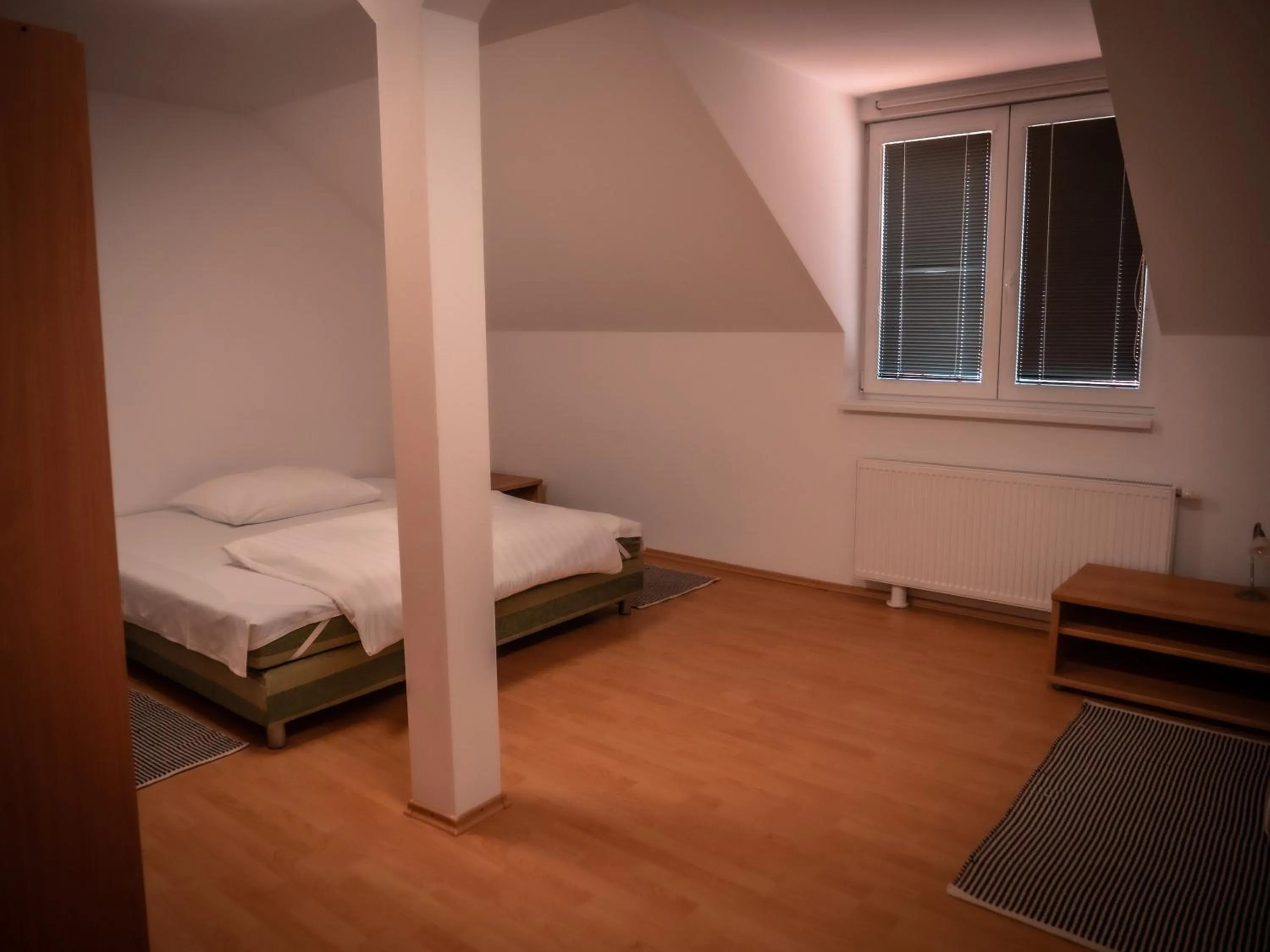 Bedroom, Bed in Hotel Novy Kastiel - Self check-in