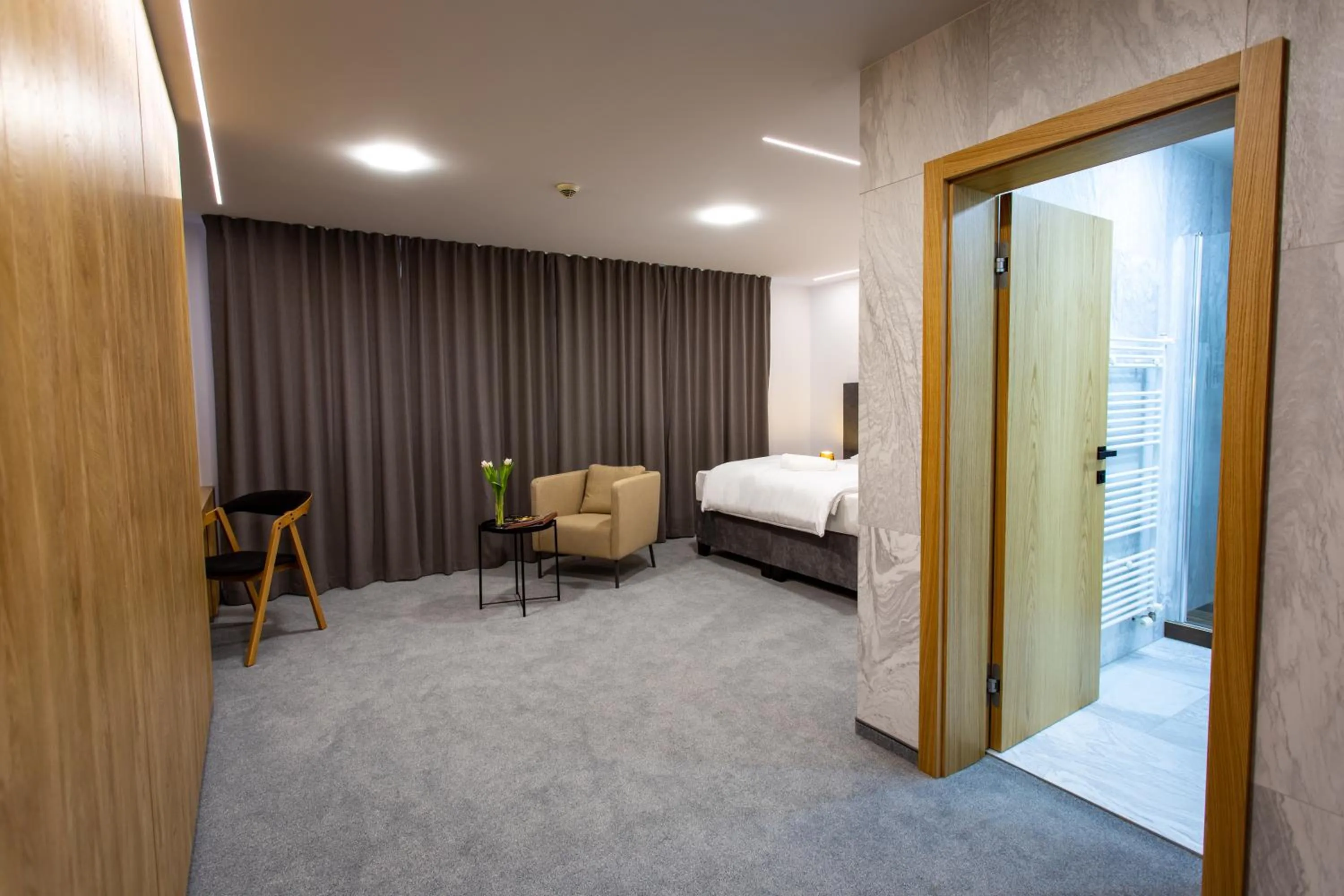 Photo of the whole room, Bed in Hotel Novy Kastiel - Self check-in