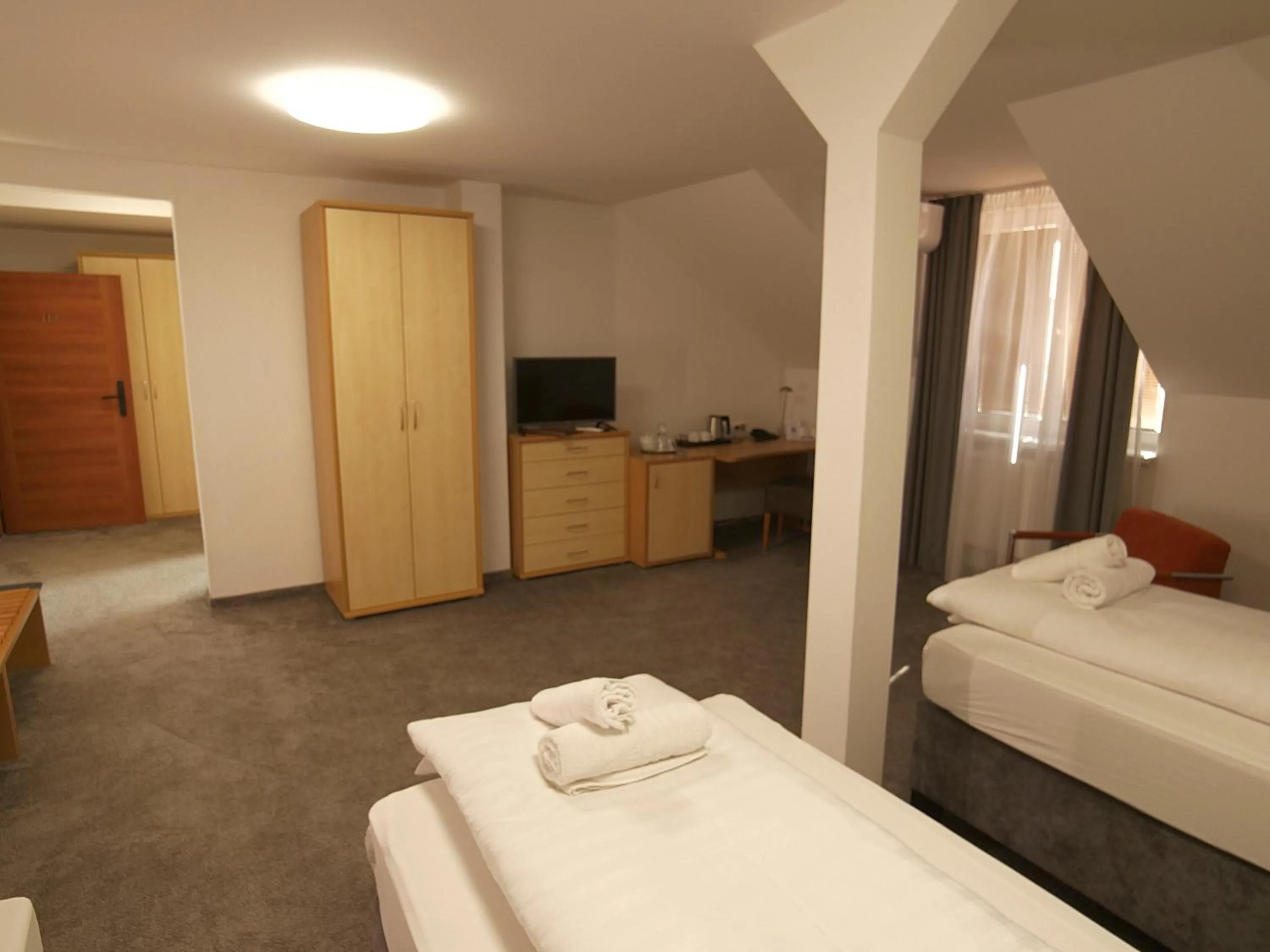 Photo of the whole room, Bed in Hotel Novy Kastiel - Self check-in