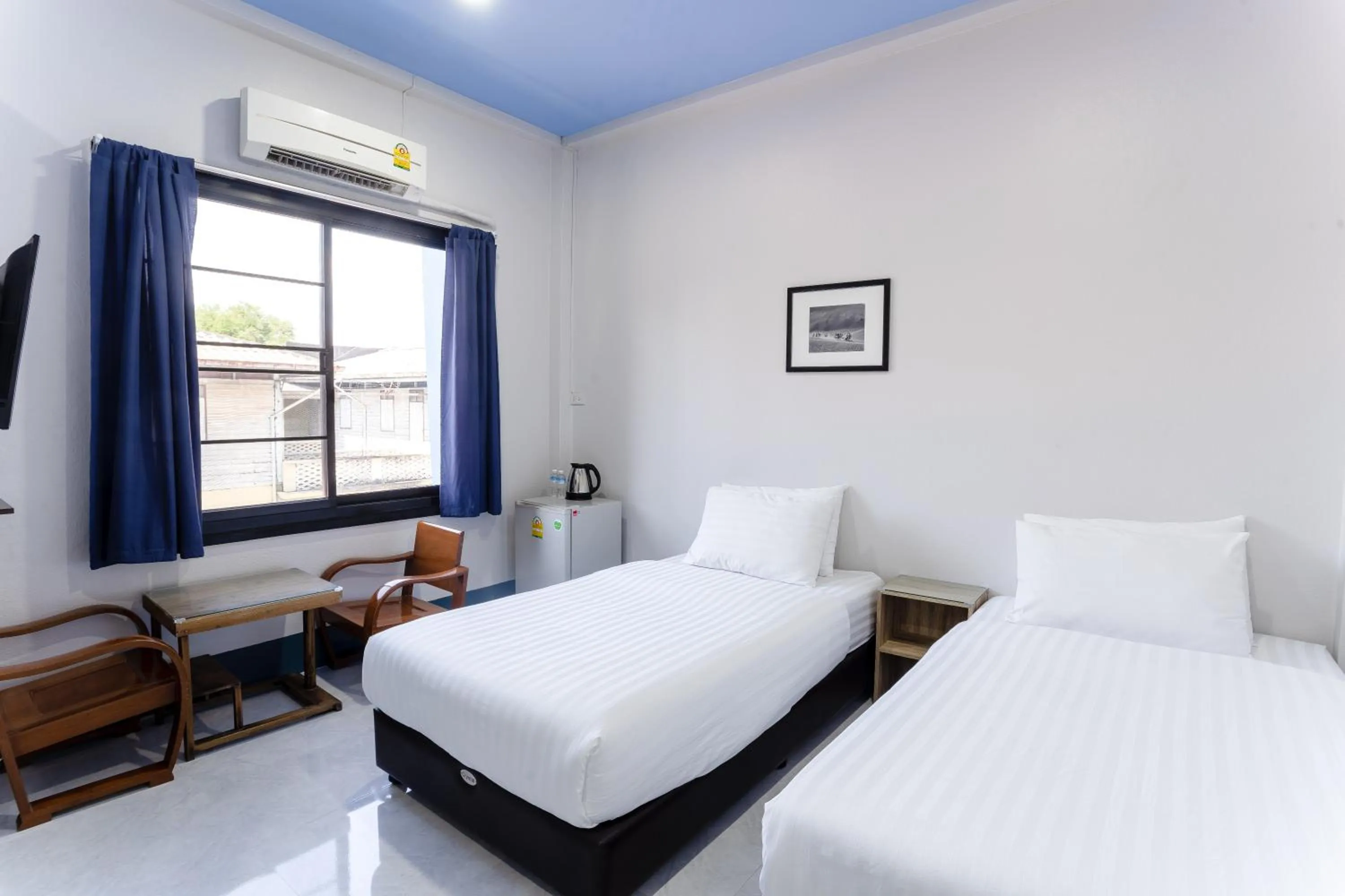 Bed in Udomsuk Hotel