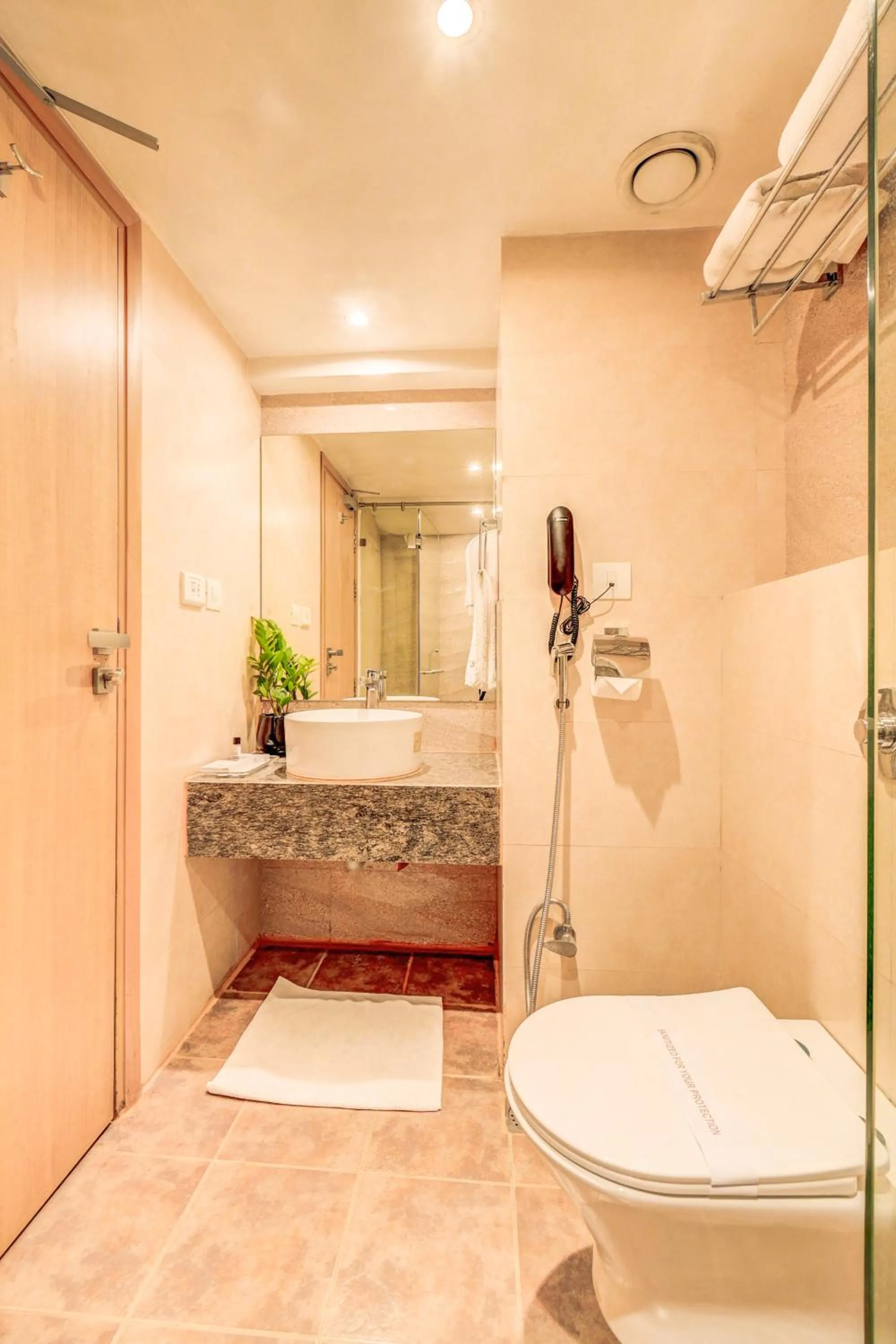 Toilet in The SSK Solitaire Hotel & Banquets