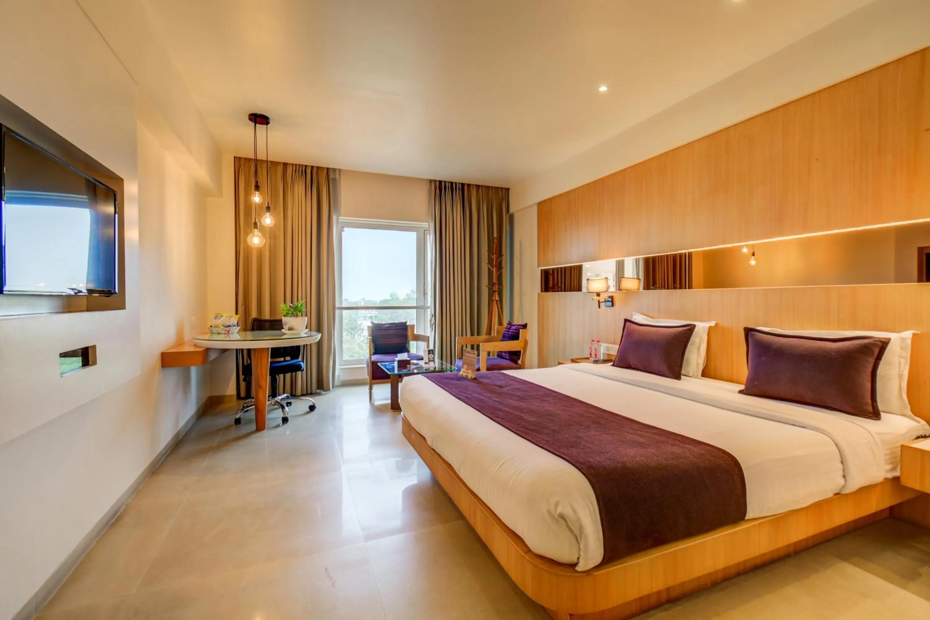 Bed in The SSK Solitaire Hotel & Banquets