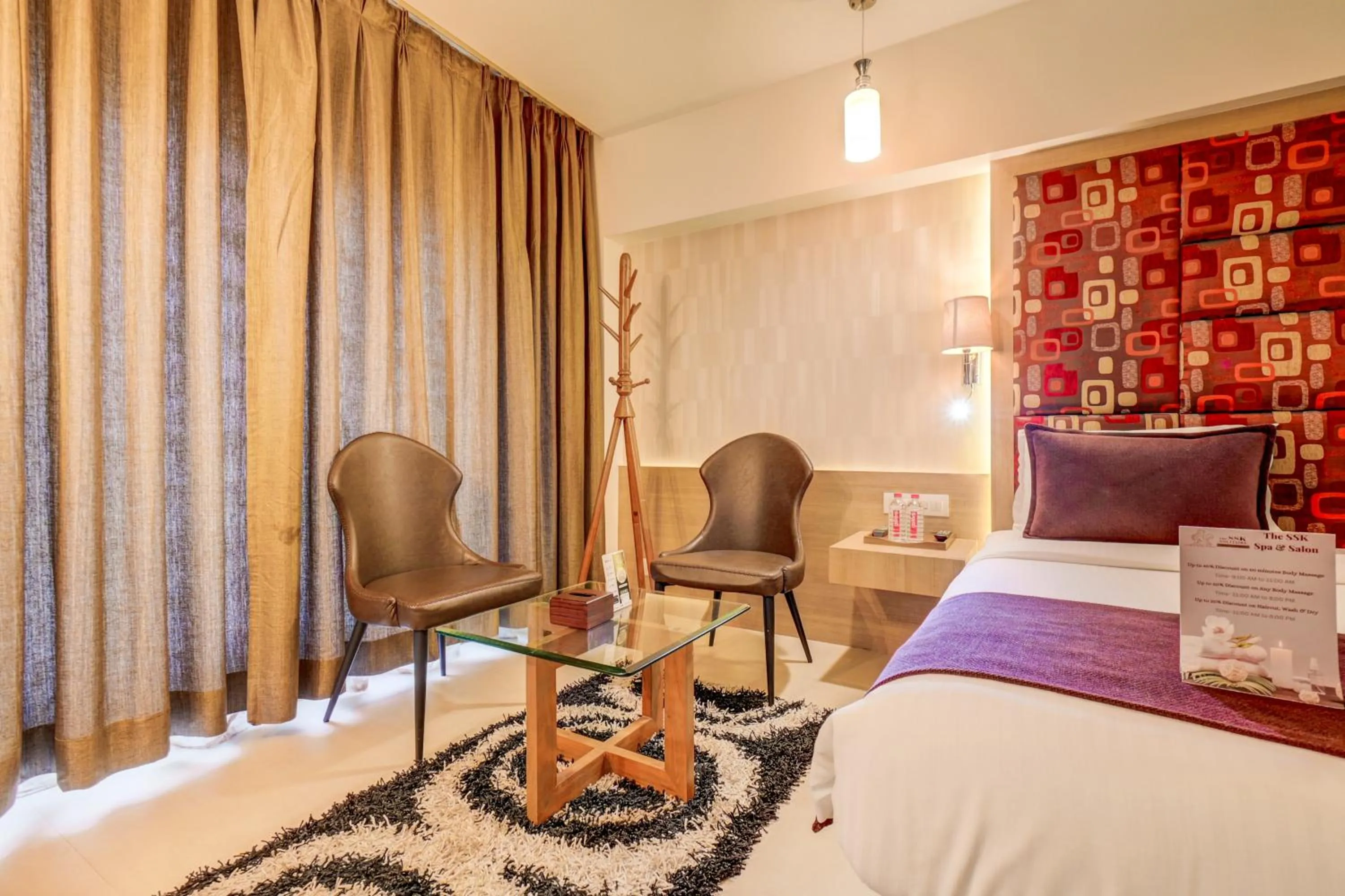 Bedroom, Bed in The SSK Solitaire Hotel & Banquets