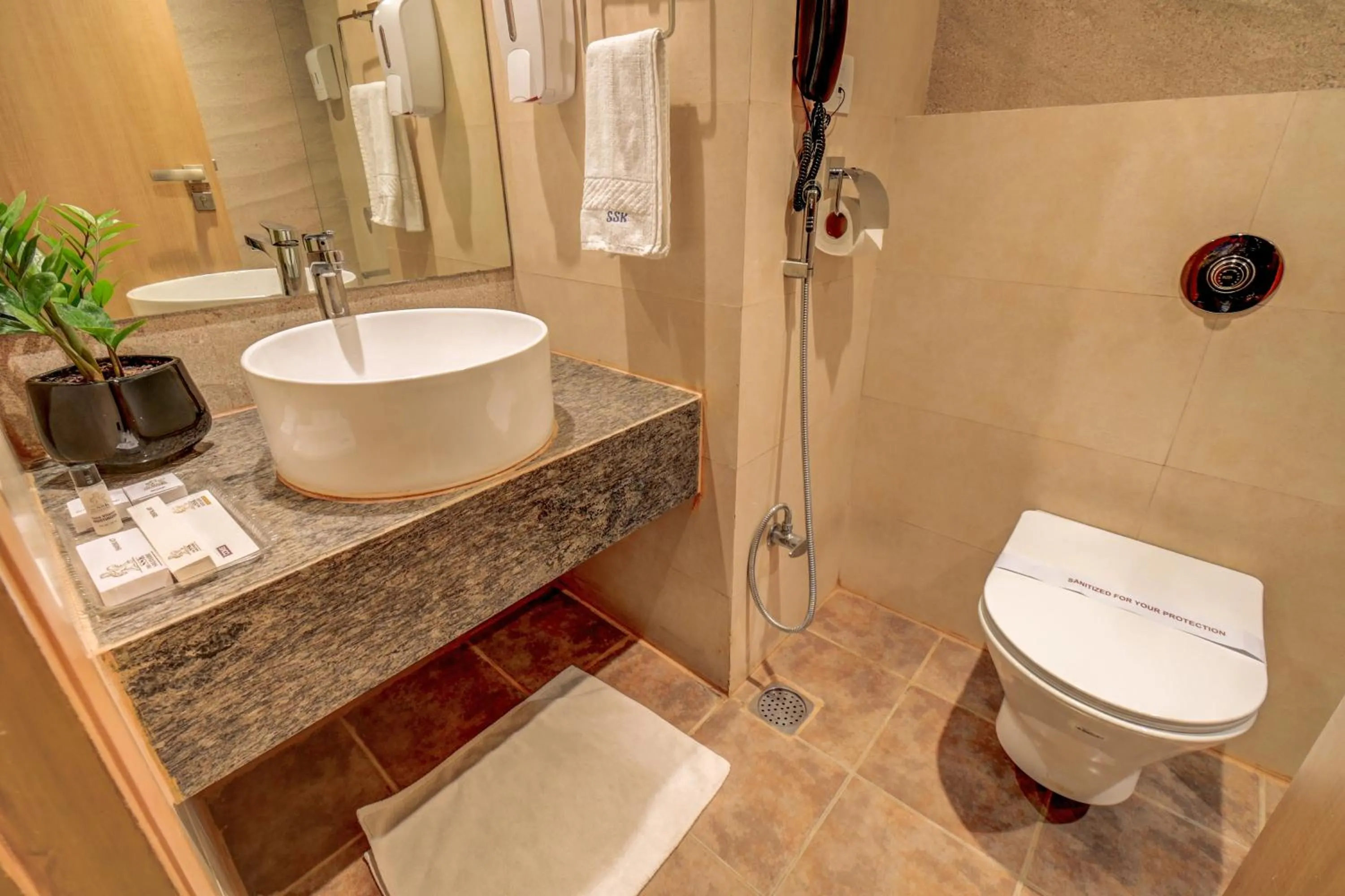 Toilet in The SSK Solitaire Hotel & Banquets