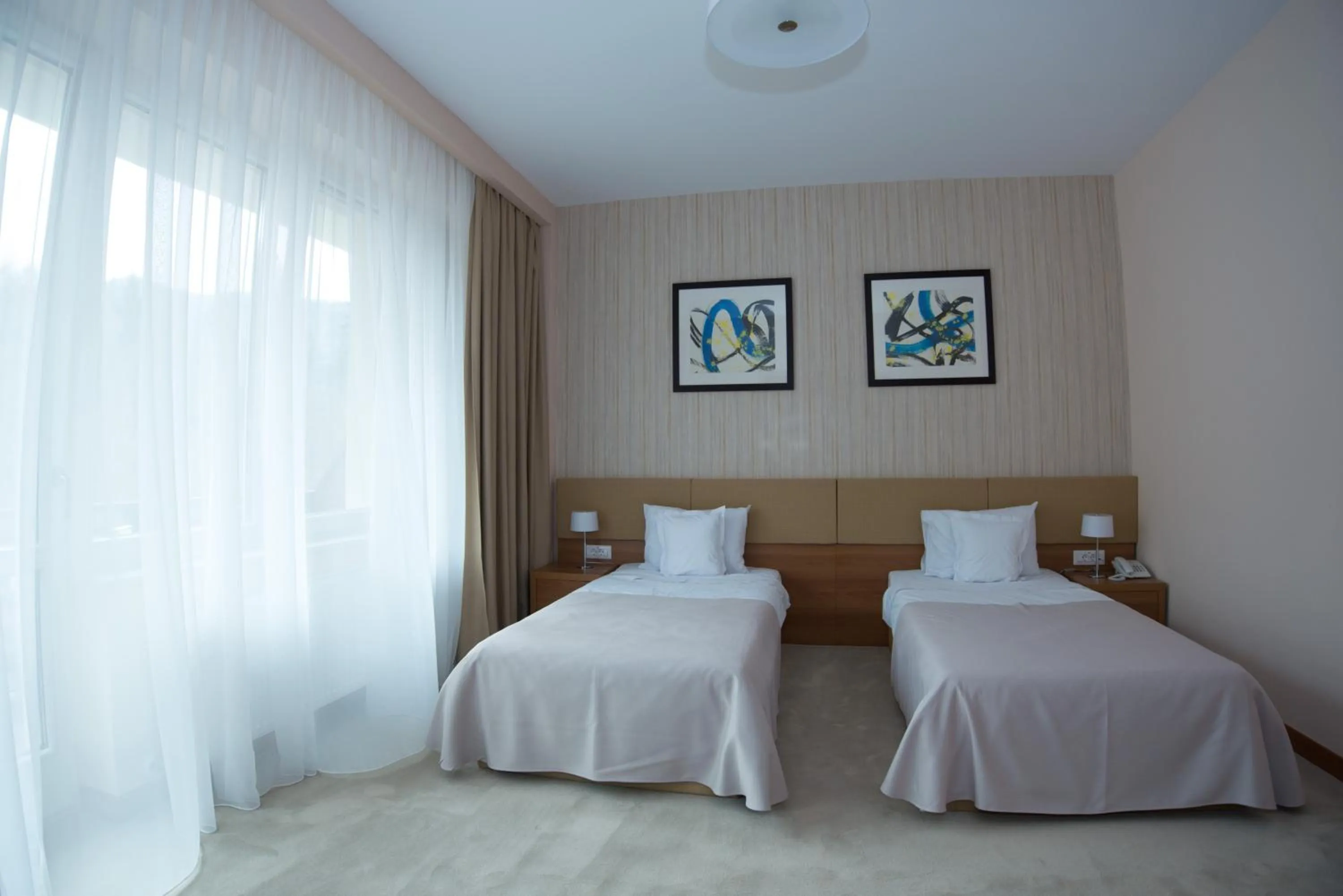 Bedroom, Bed in Hotel TTS**** Spa&Wellness Covasna