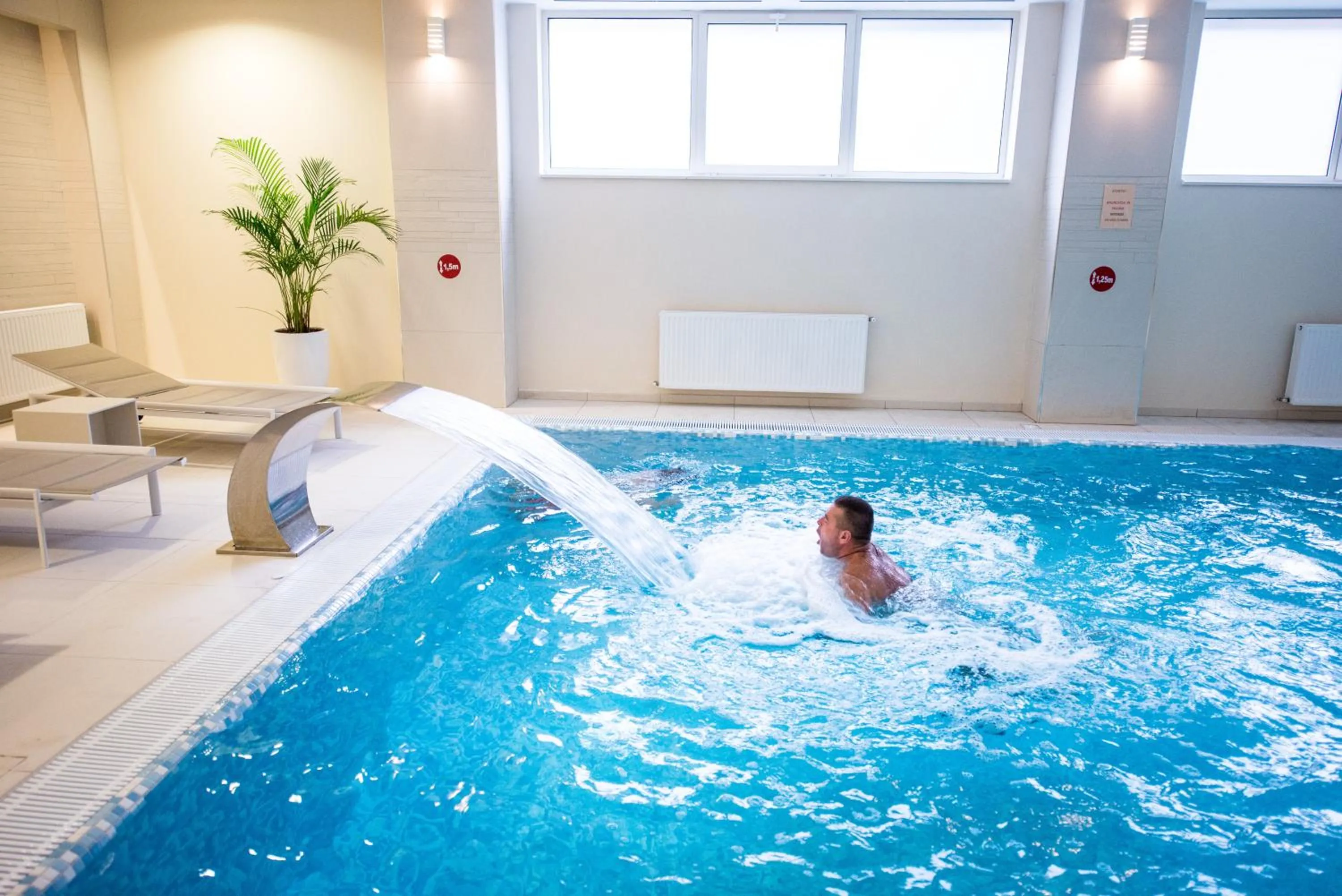 Swimming pool in Hotel TTS**** Spa&Wellness Covasna