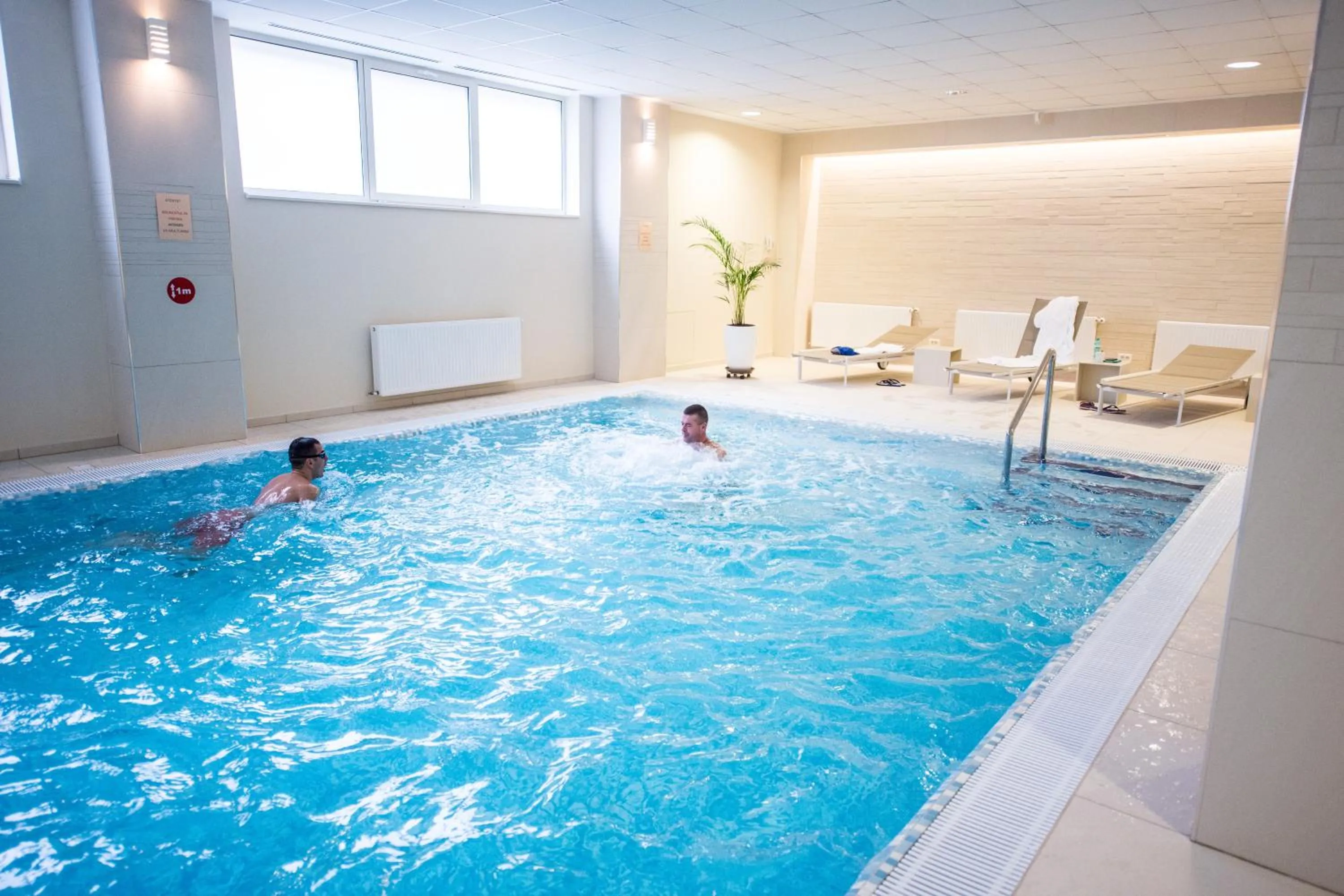 Swimming pool in Hotel TTS**** Spa&Wellness Covasna