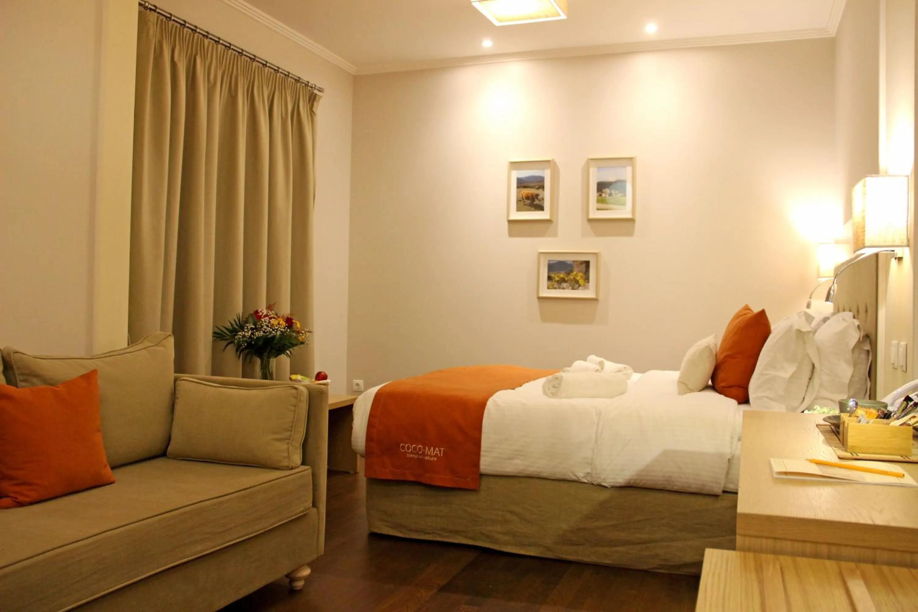 Bed in Olympus Terra Boutique Hotel