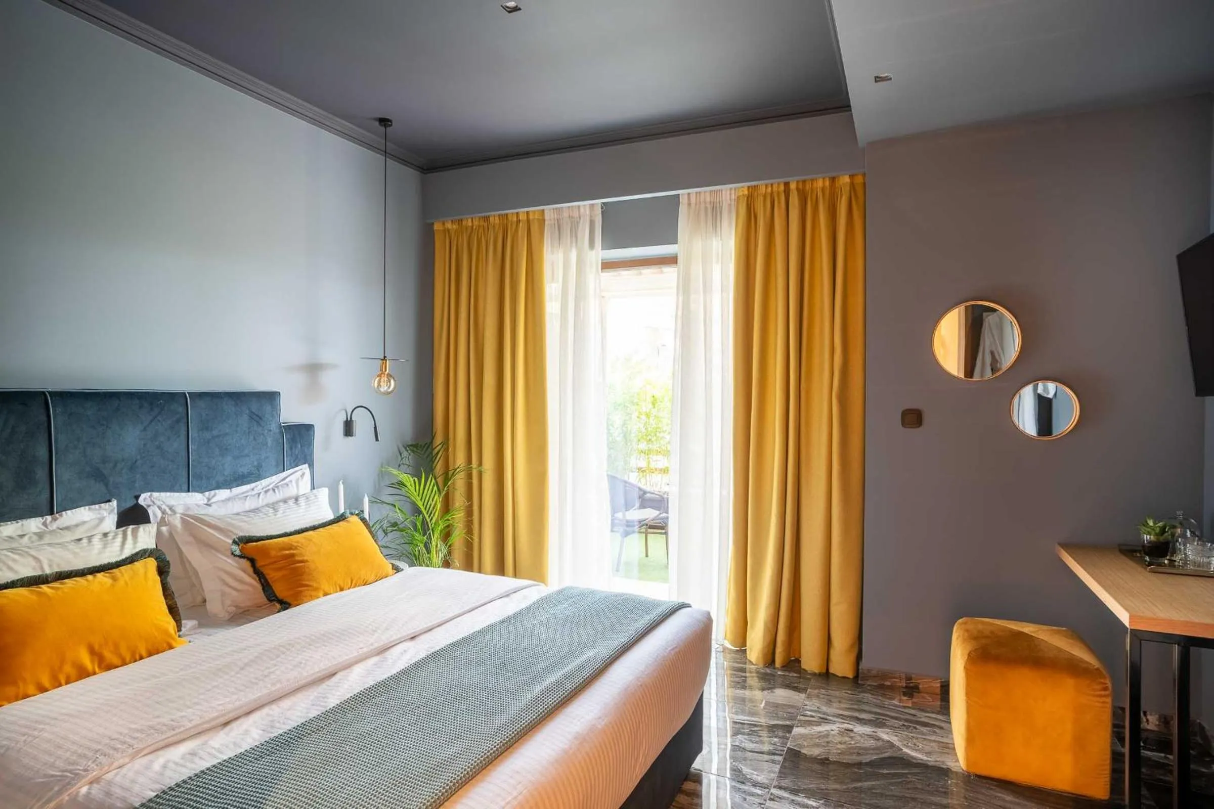 Bed in Olympus Terra Boutique Hotel